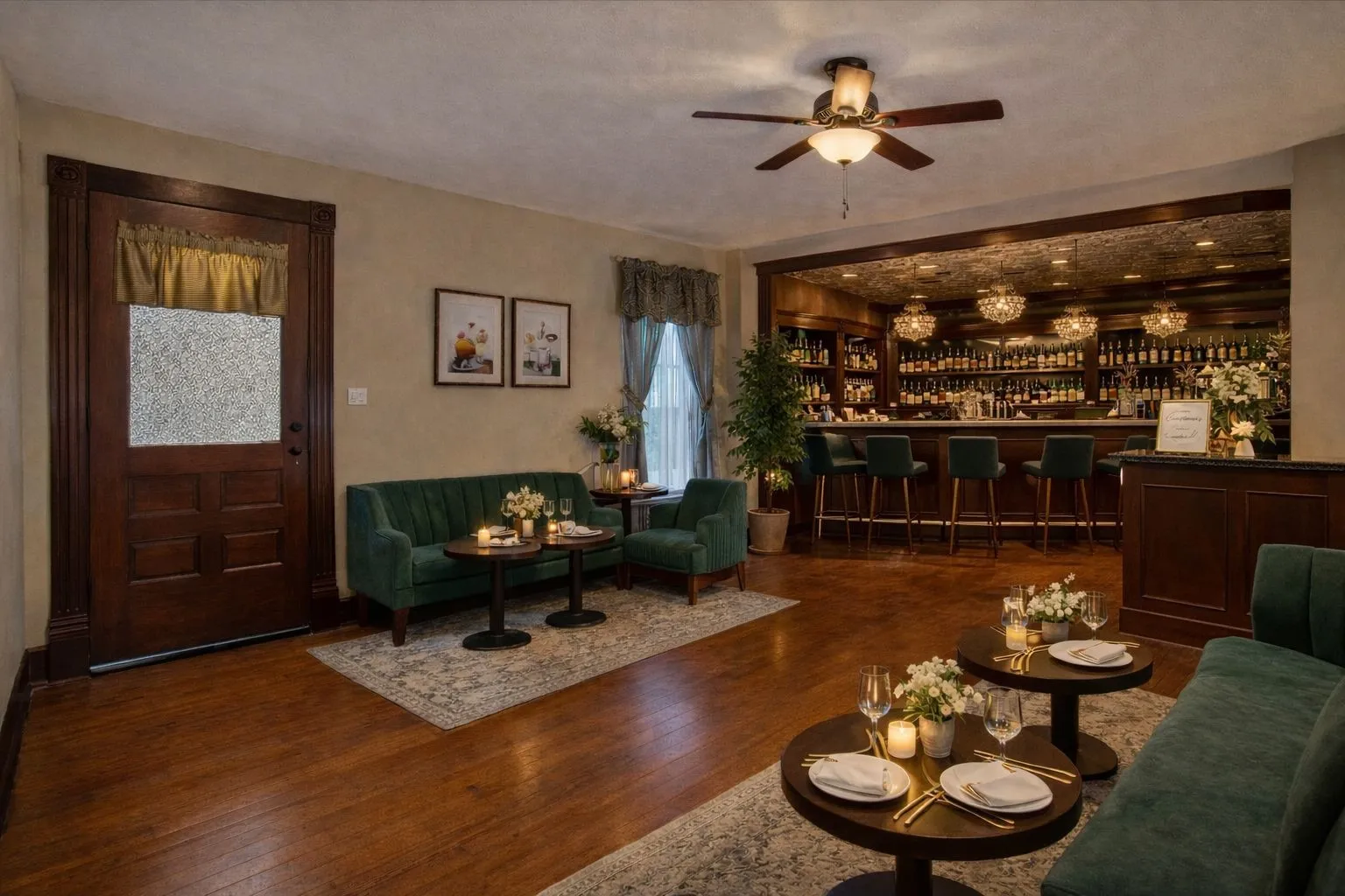 Rich wood-finish flooring extends throughout this space featuring an integrated bar with built-in shelving, a ceiling fan with light fixture, and a detailed wood entry door with textured glass panel