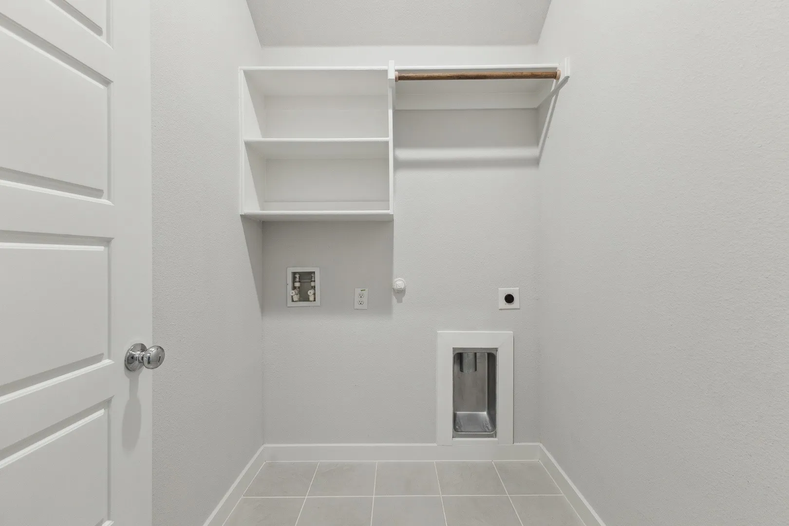 Utility room in the Quartz home plan by Trophy Signature Homes – REPRESENTATIVE PHOTO