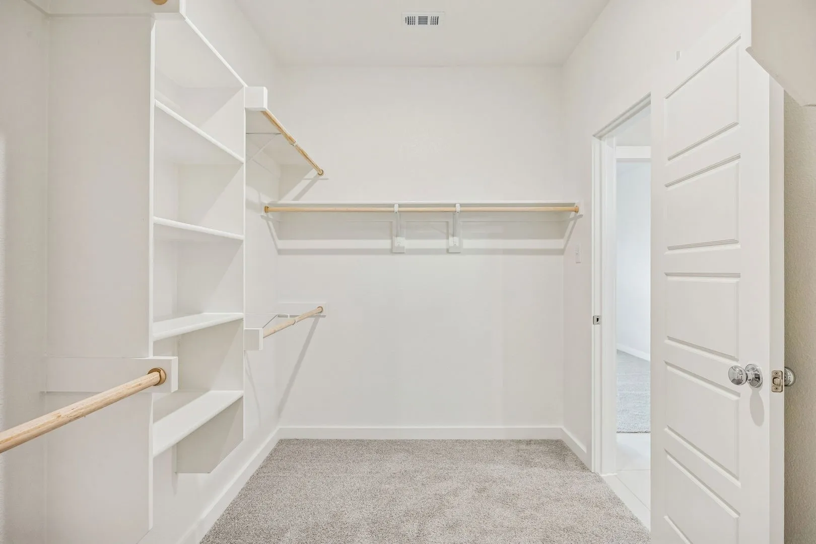 Primary Closet in the Stanley II home plan by Trophy Signature Homes – REPRESENTATIVE PHOTO