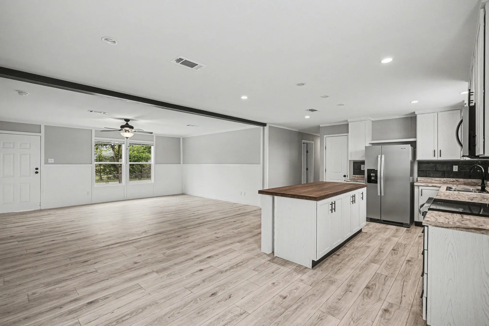 Open-concept kitchen and living area.
