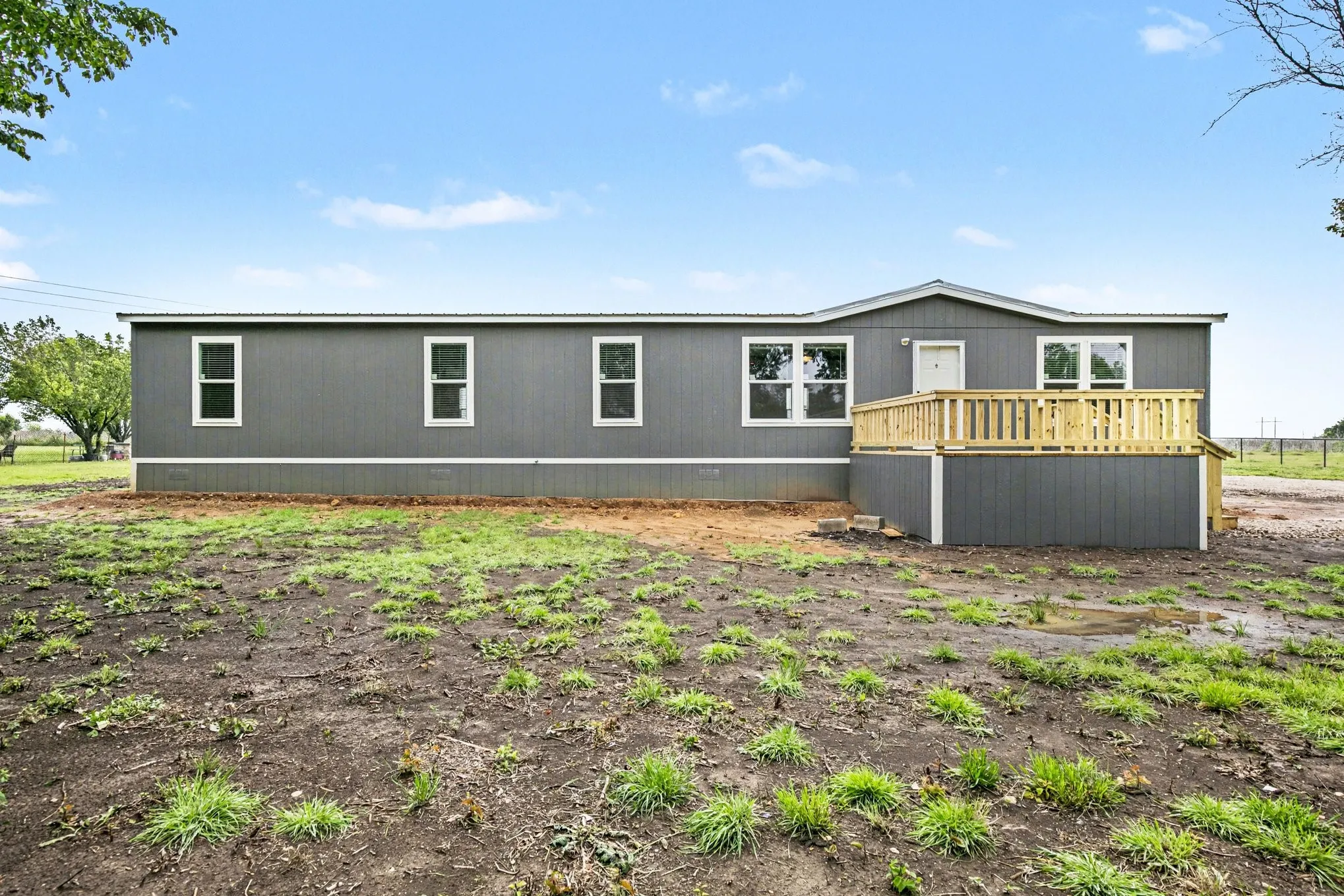 Modern new home on a sought-after serene one acre of privacy.