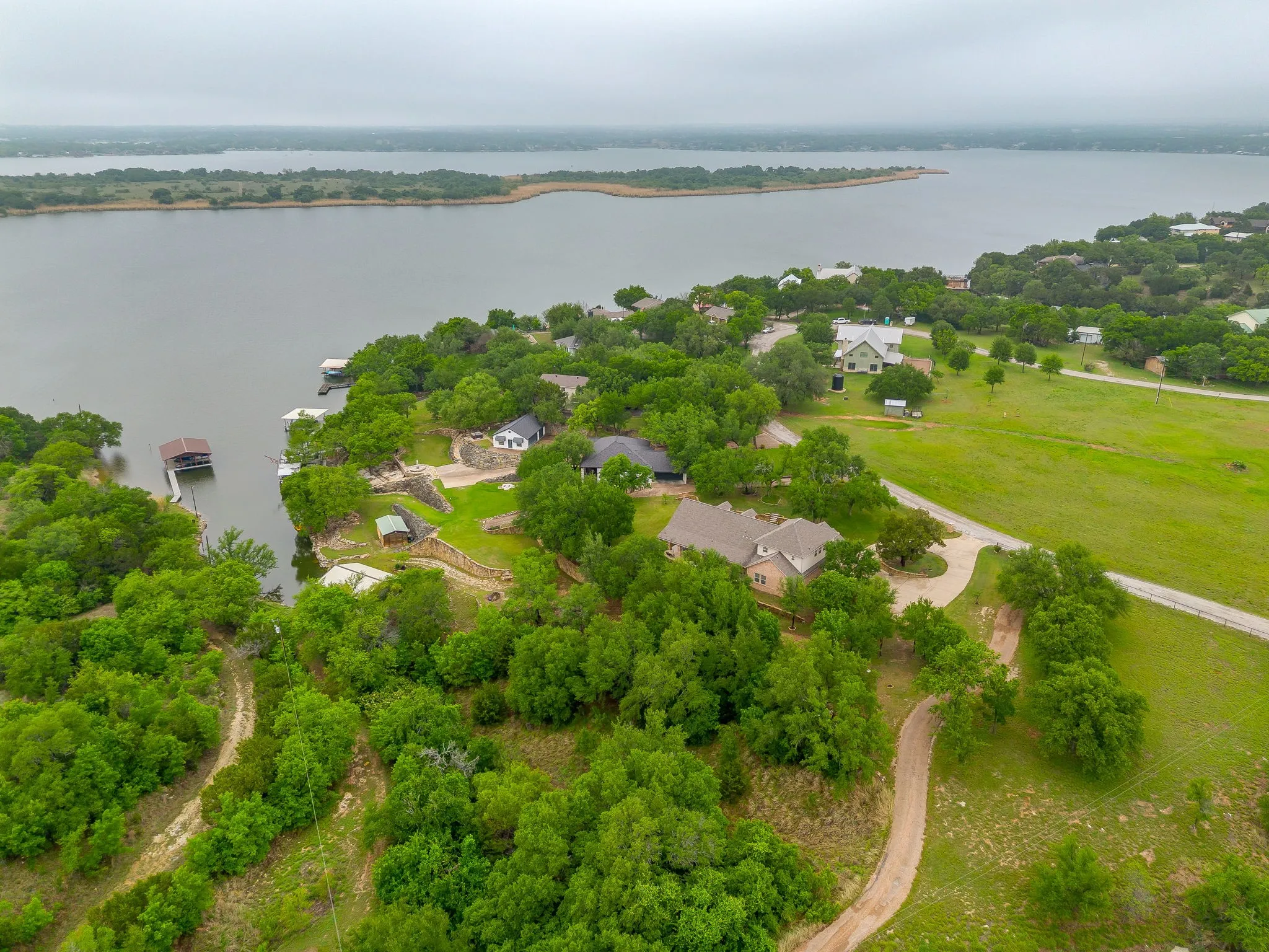 Waterfront property featuring multiple boat docks