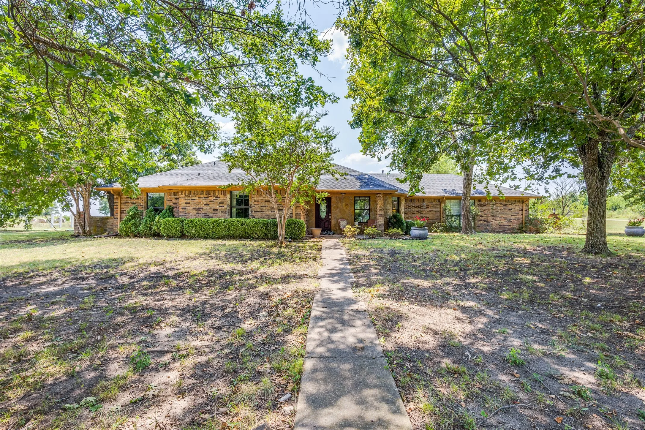 Spacious home with many updates including roof in 2022 and full gutters