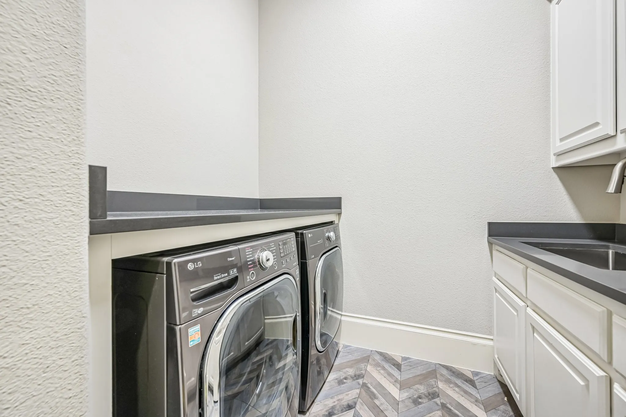 Laundry Room with Sink and Folding Area