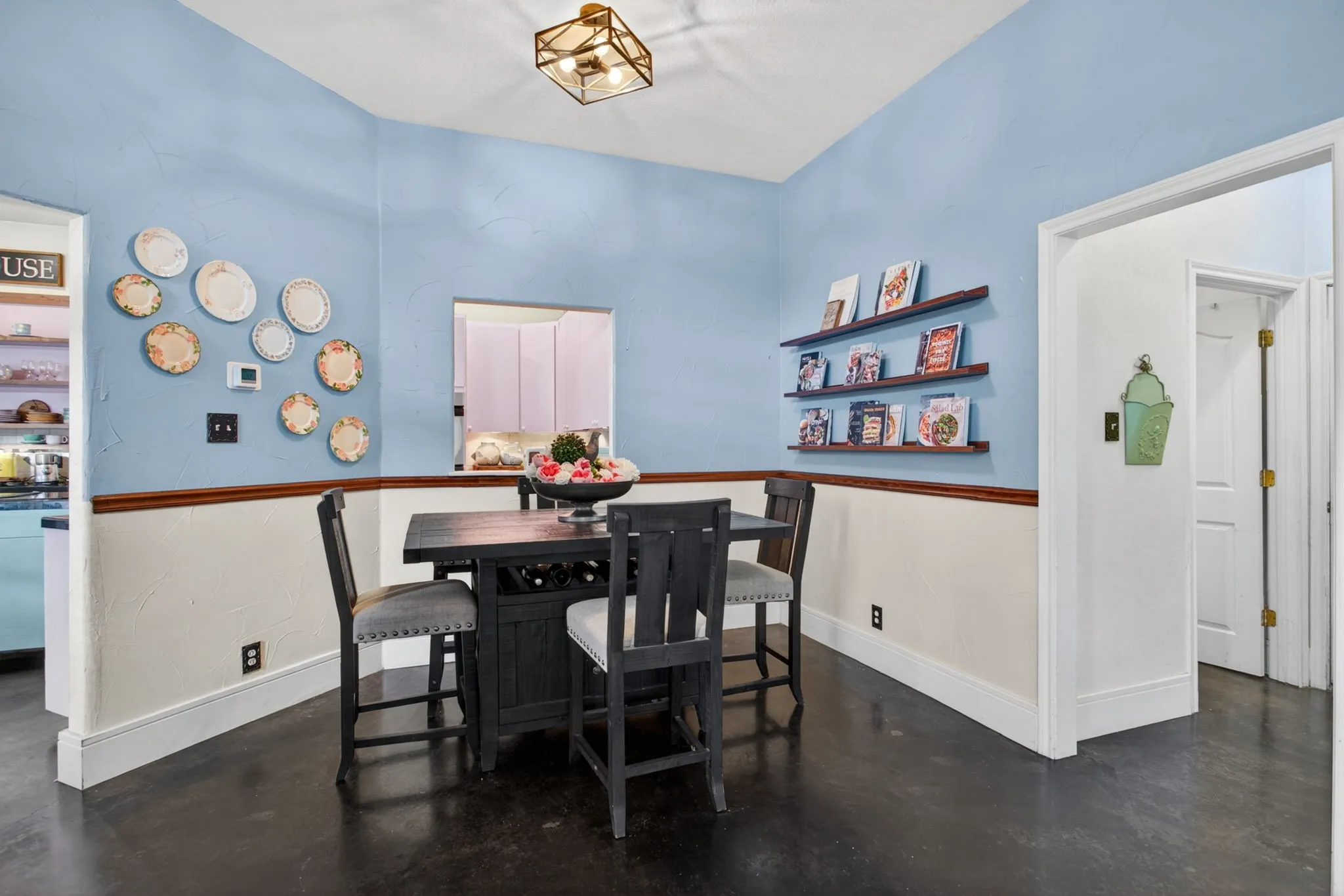 Another view; notice the high baseboards, the chair railing, and the bullnose corners.