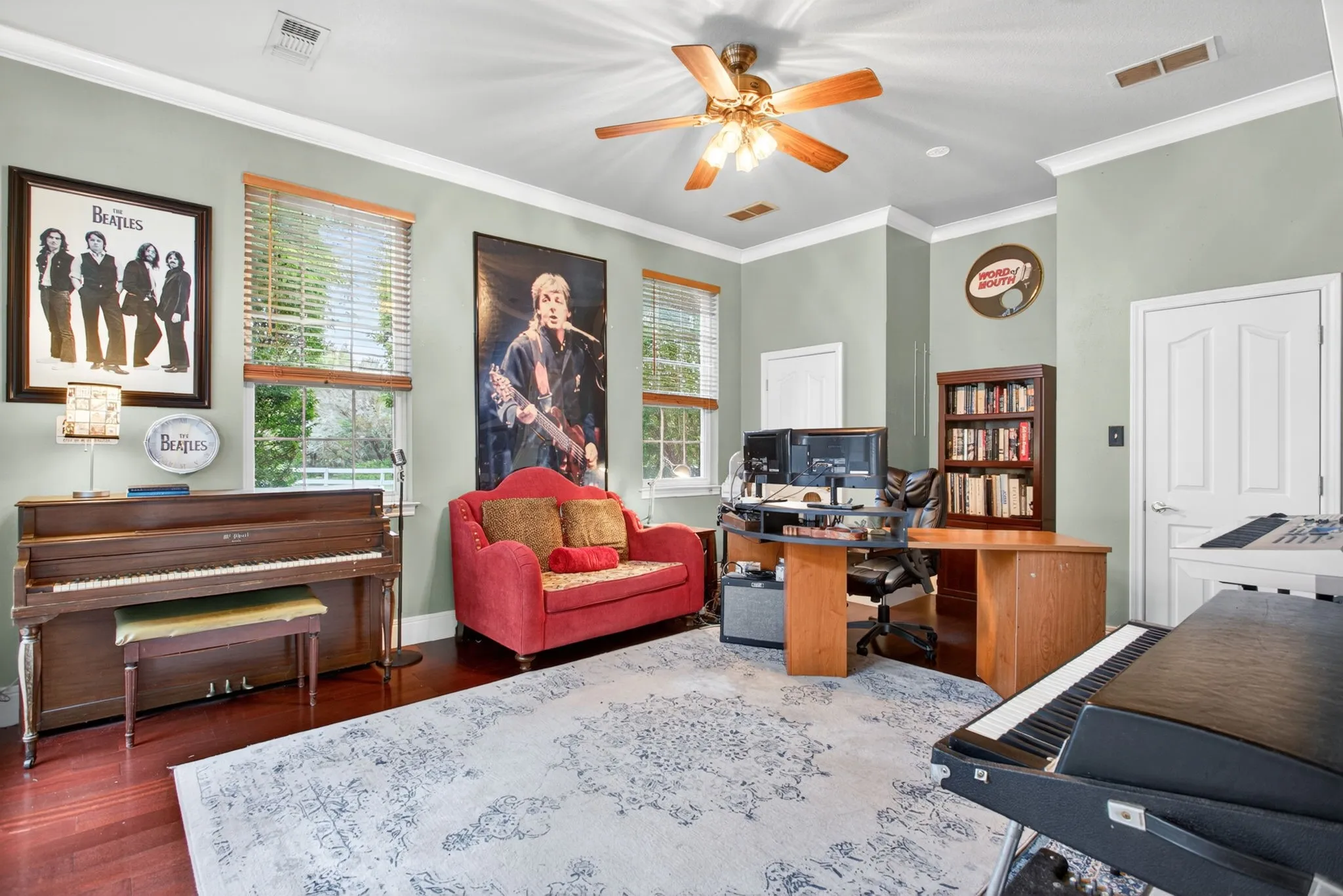 Incredible third bedroom with hard floors, crown molding, and dual closets.