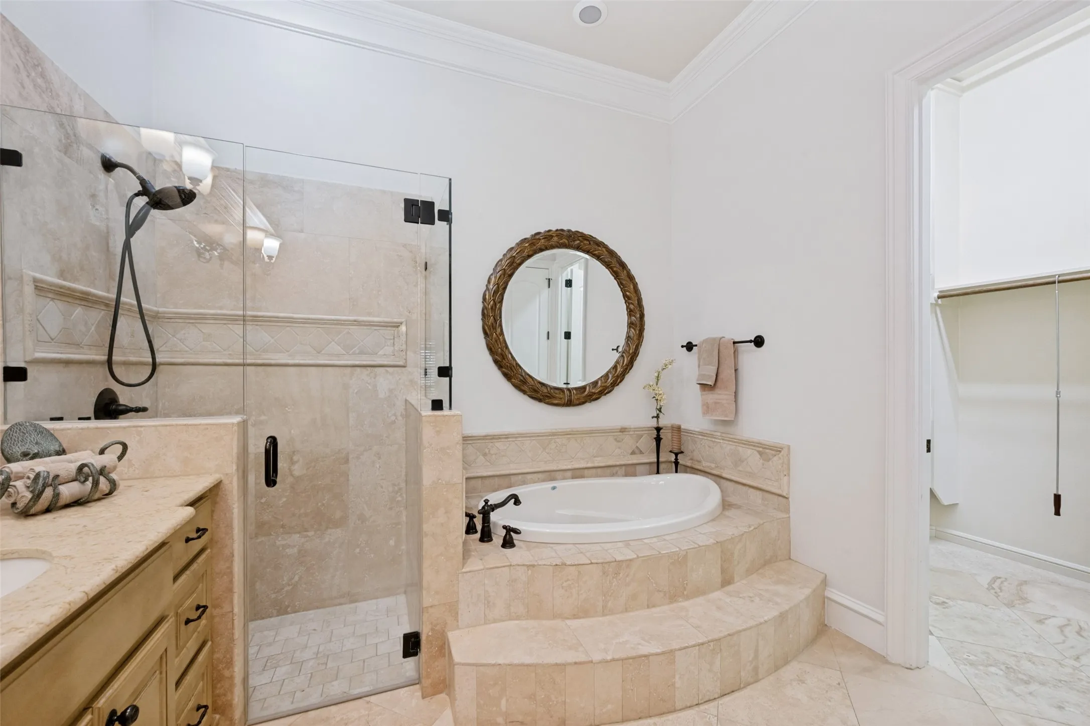 Primary Bath with View to Walk-in Closet