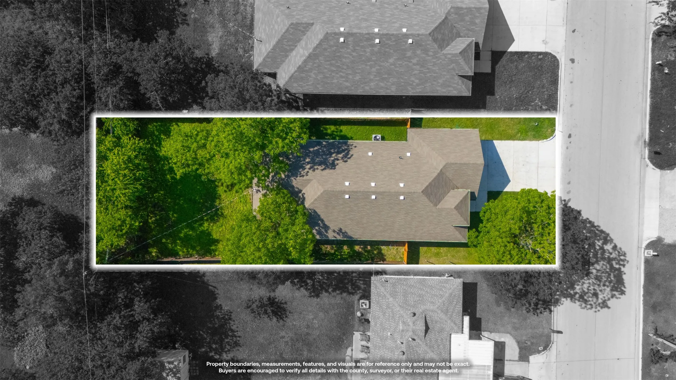 Aerial view showcasing a residential property with a brown shingle roof, a concrete driveway, and established trees