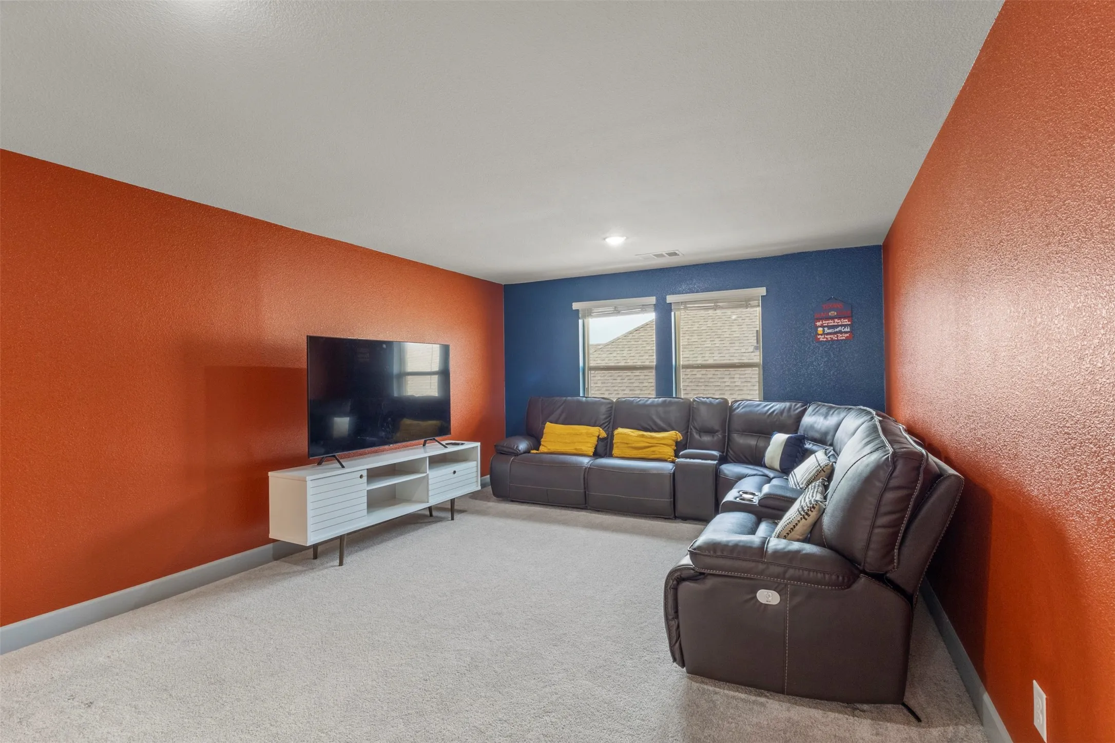 Large upstairs room used as media. Can easily be a game room or secondary family room