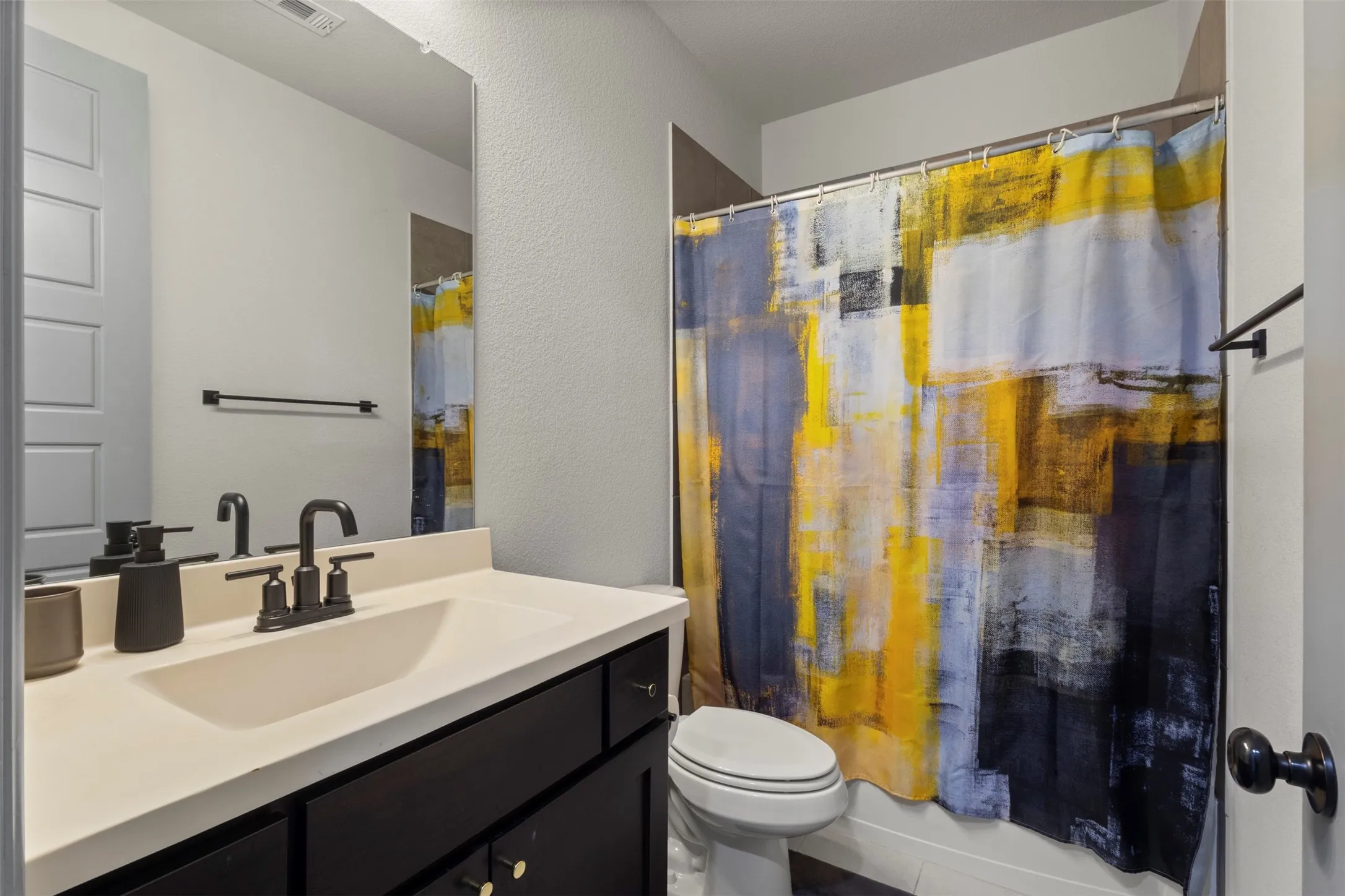 Bathroom off the secondary bedroom downstairs.
