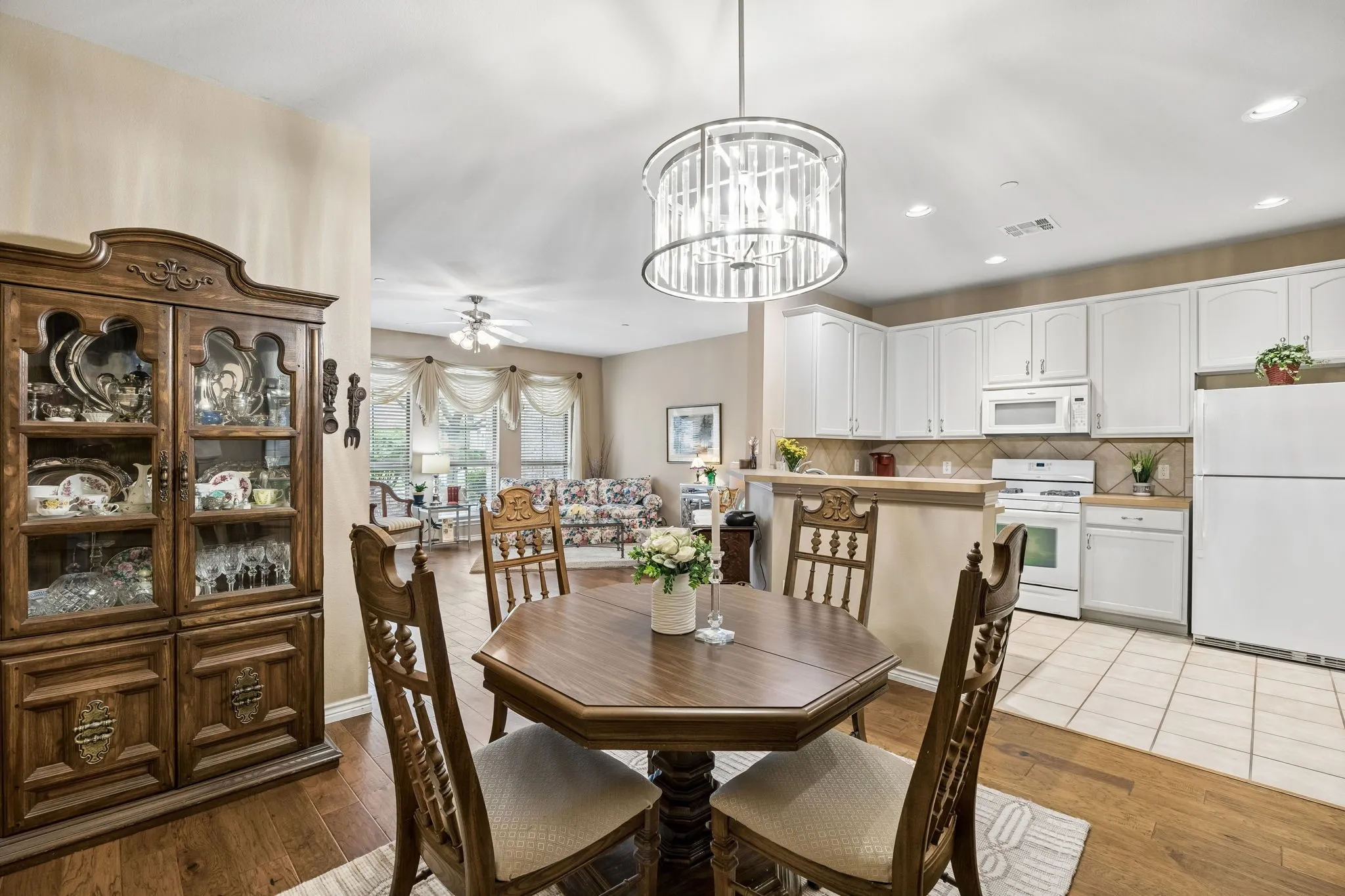 Love this view of the tasteful Dining Area - Large enough for the largest of China Cabinetry and Eating Area - all open to the Kitchen and Living areas!