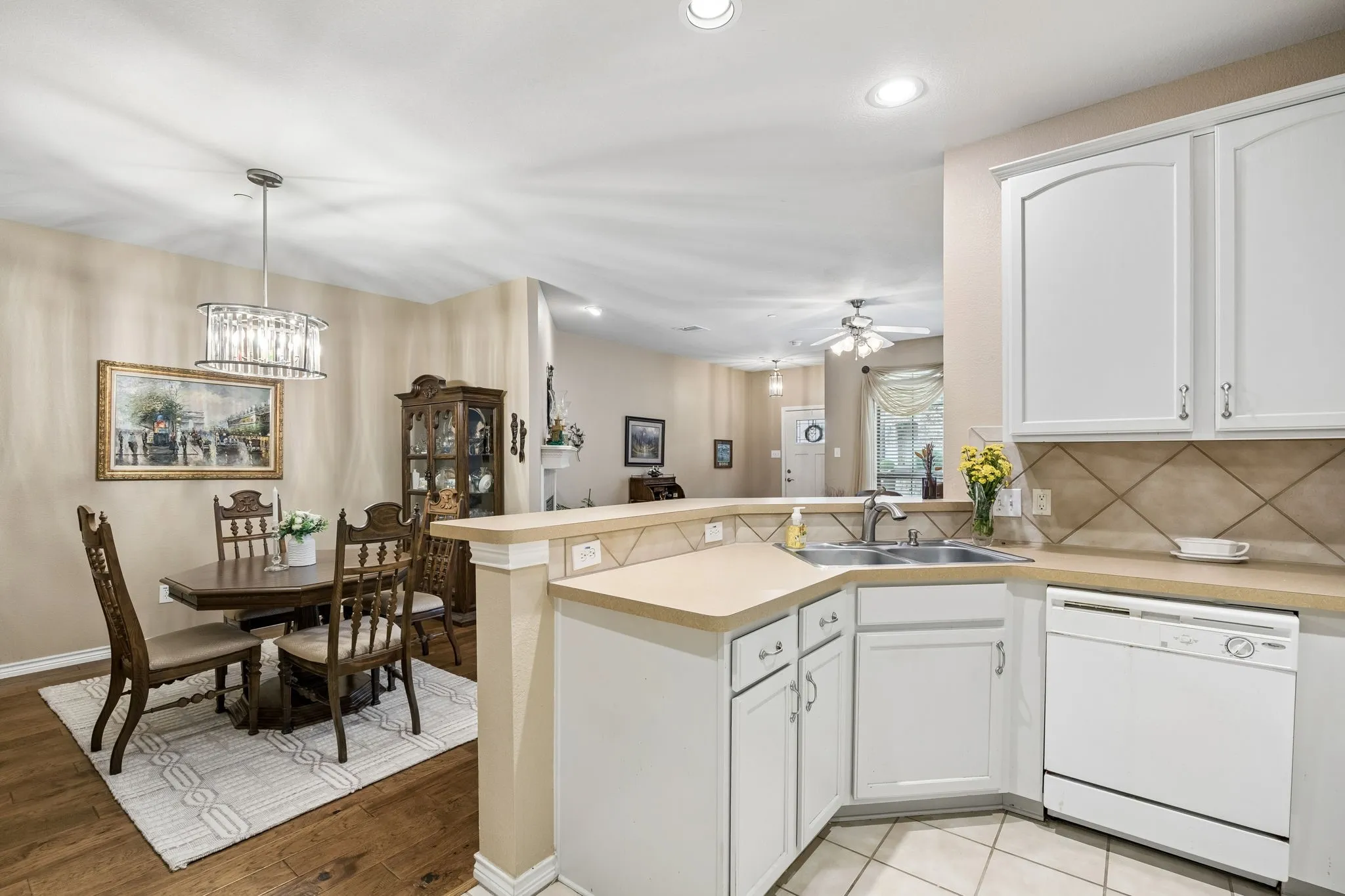 Th open kitchen overlooks the dining and living spaces for effortless connection and everyday comfort.