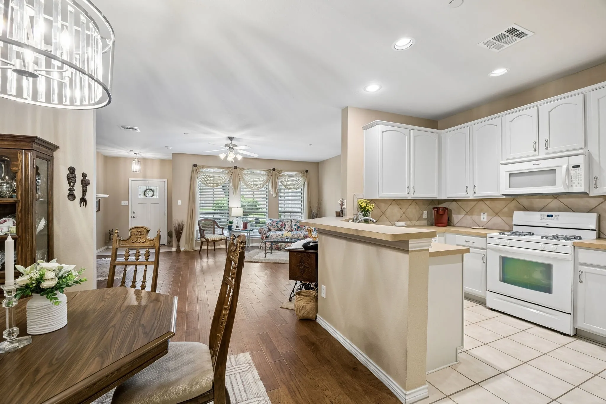 This view really shows off the spacious and yet warm and inviting floorplan of this warm and inviting townhome!