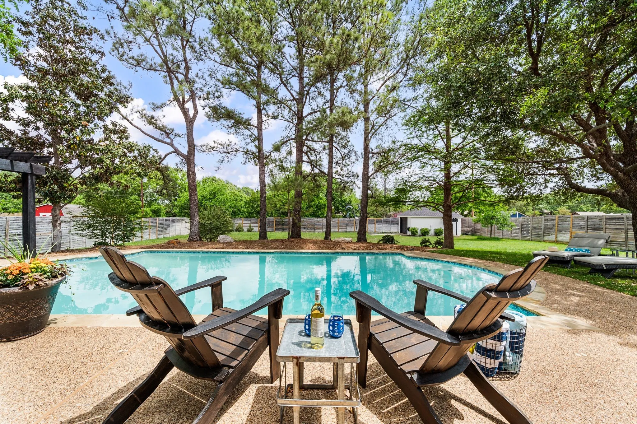The salt water pool has undergone recent renovations with new tile and coping and deck repair.
