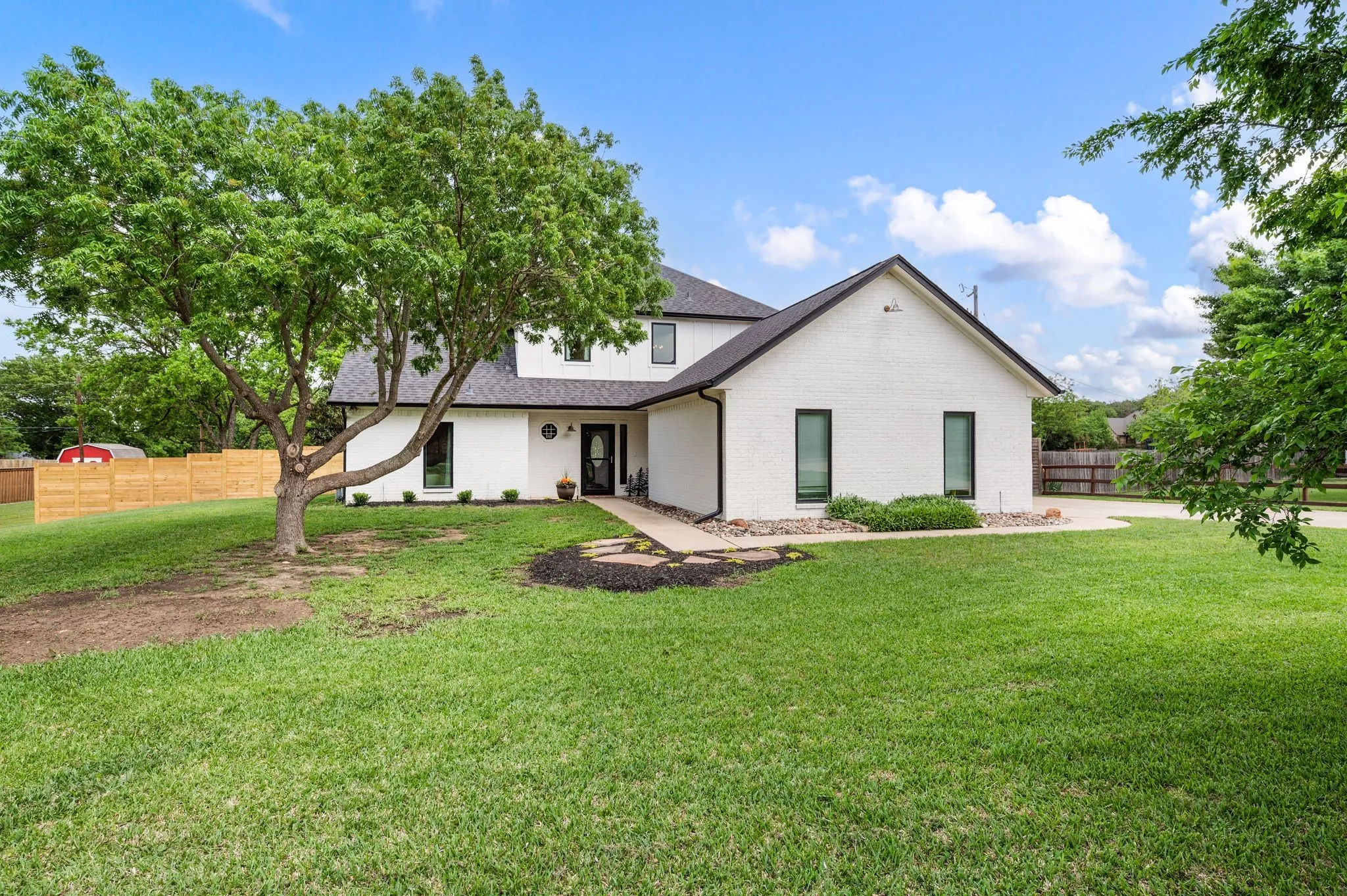 This beautiful farmhouse home is seated on a treed, huge .79 acre lot.  Some recent updates to important systems include the AC units in 2023 and 2024 and the water heater in 2024. Roof and gutters replaced in 2021. Siding and backing replaced in 2022.
