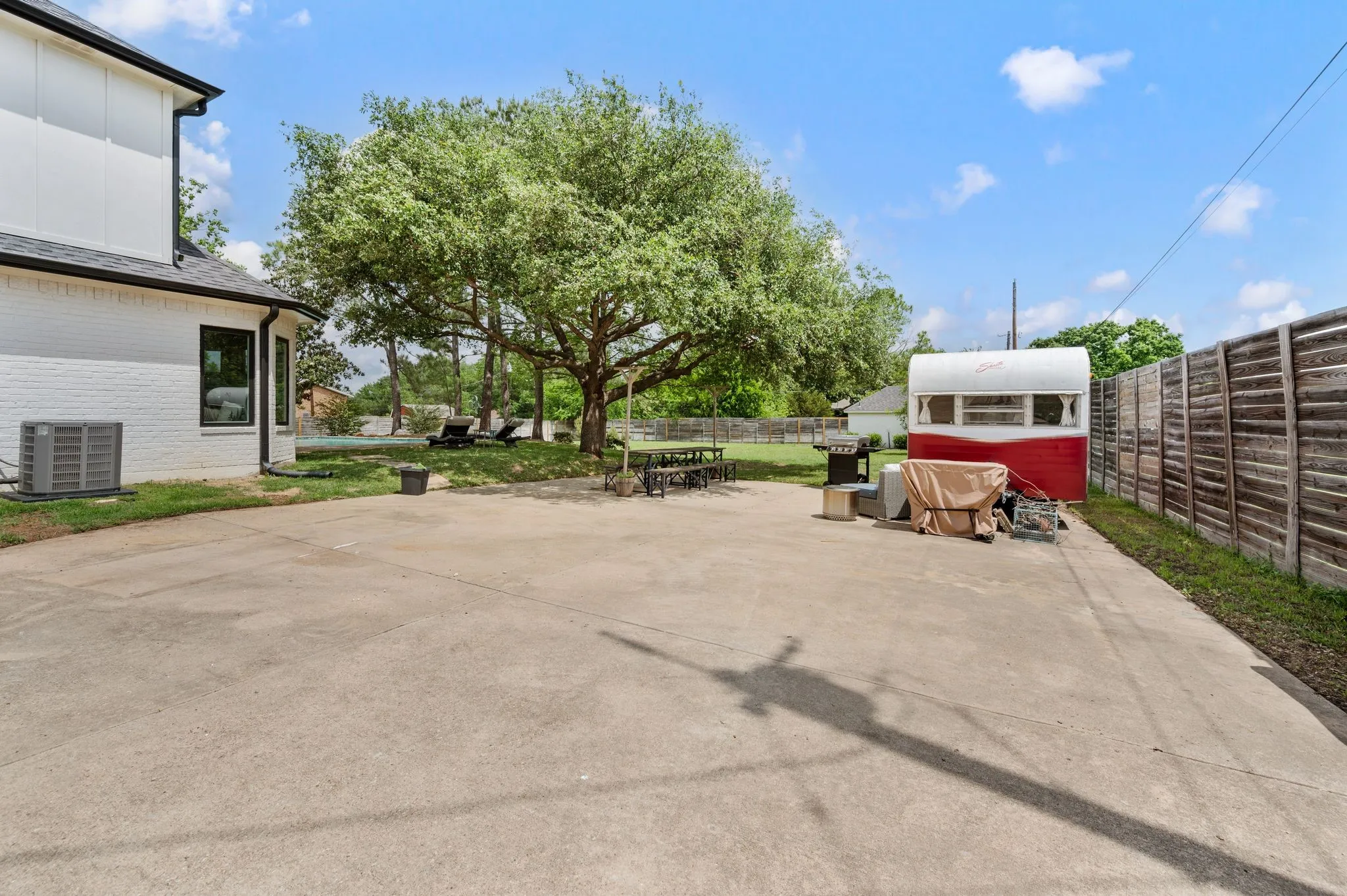Behind a double wide gate you'll have plenty of room to park your RV or camper, a boat and jet skis.