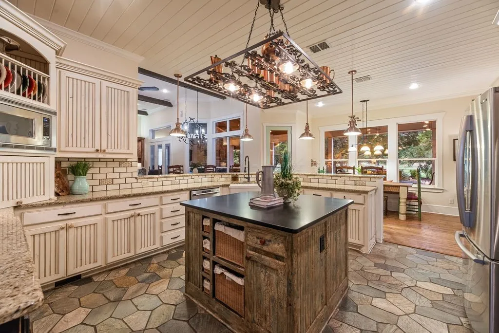 Travertine flooring and a great amount of storage capacity
