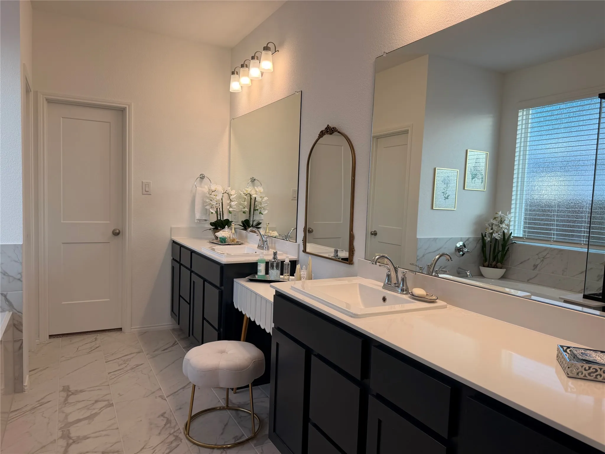 En-Suite Primary Bath with Separate Vanities and Space to Add a Sit-Down Vanity