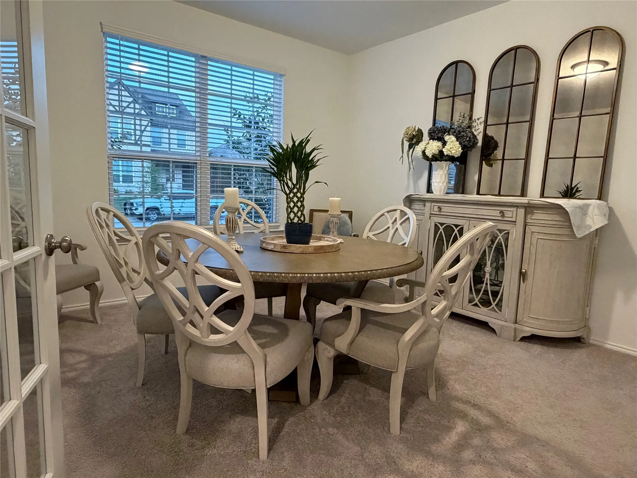 Formal Dining Room Features Elegant French Doors. Located at the Front of the Home Offers the Perfect Flexibility to Serve as a Private Home Office or Closet Offers 5th Bedroom Opportunity