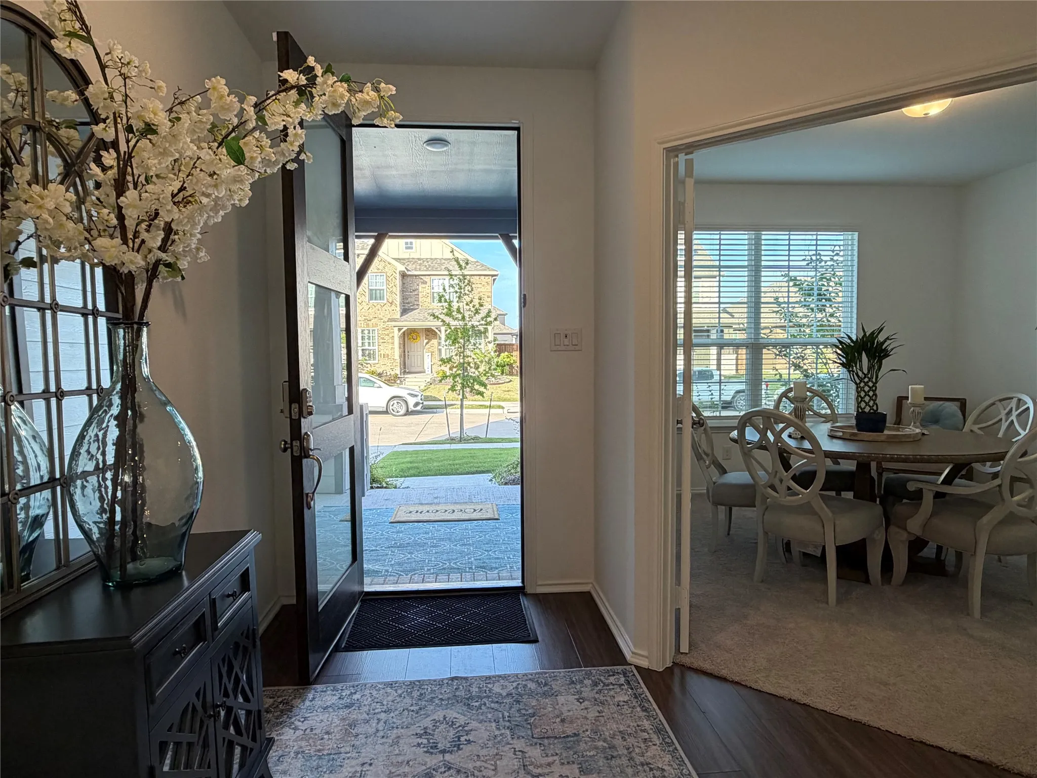 Wide Entry with Luxury Vinyl Plank Is Very Welcoming! Formal Dining Room Features Elegant French Doors. Location at the Front of the Home Offers the Perfect Flexibility to Serve as a Private Home Office.
