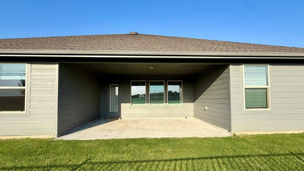Expansive covered patio featuring concrete flooring