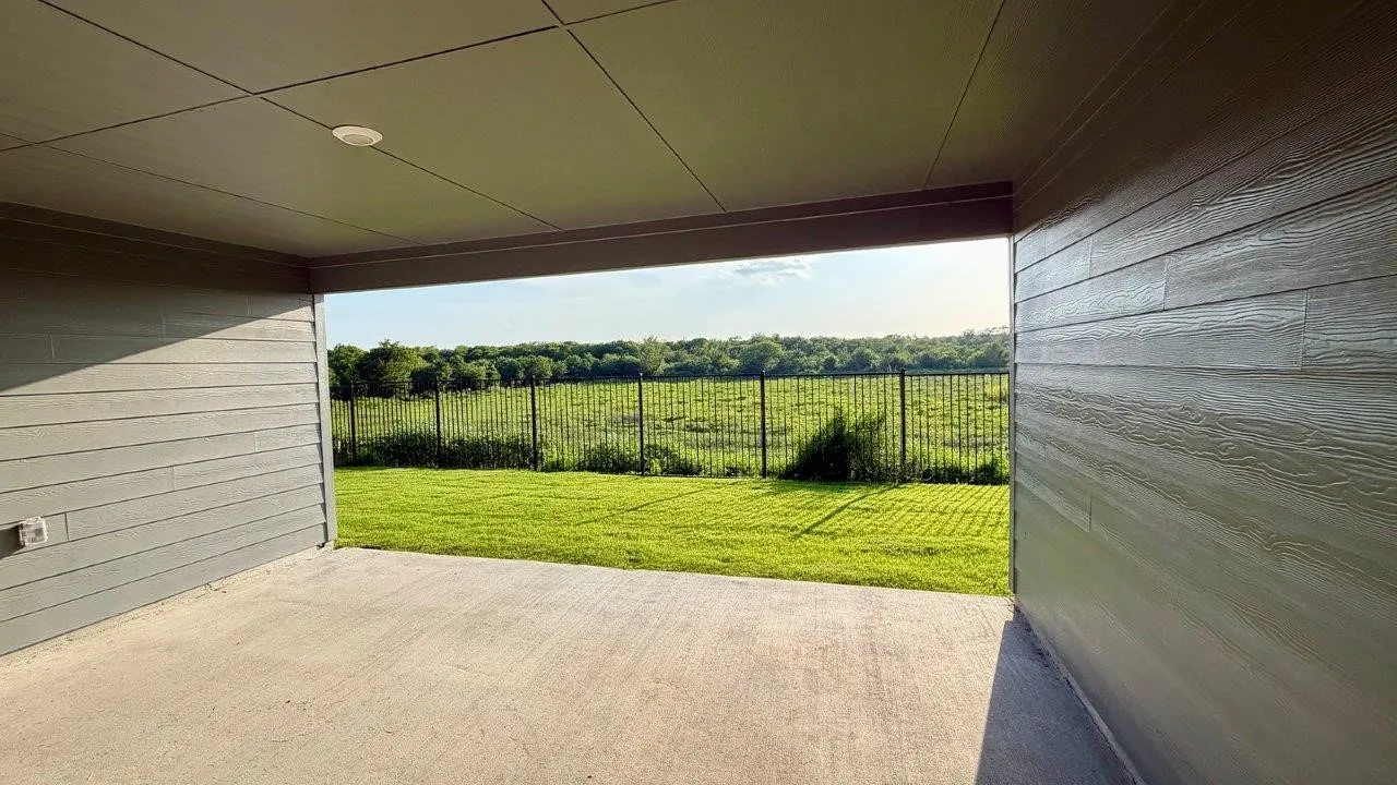 Covered patio with a concrete surface and recessed lighting