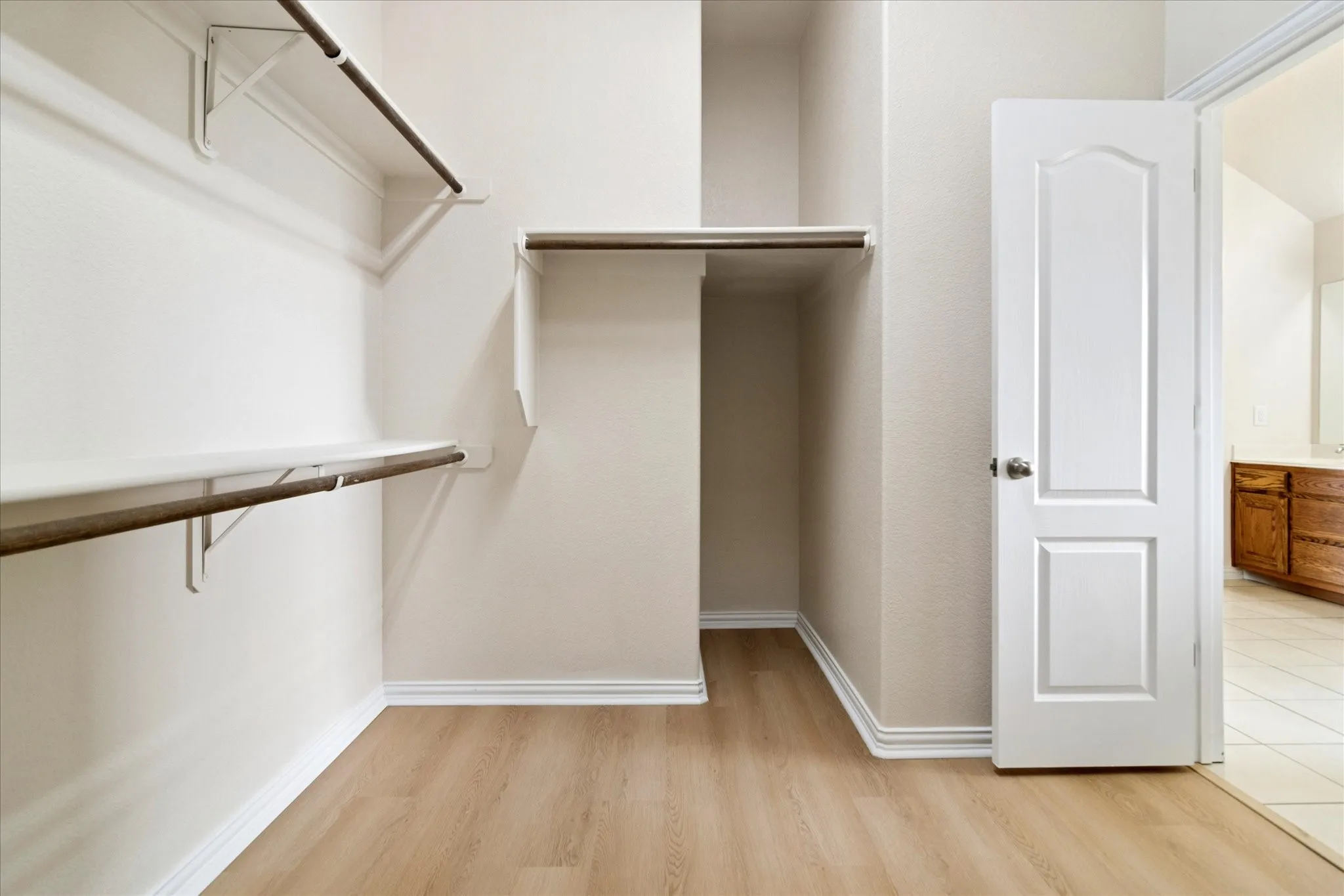 One side of the huge primary closet