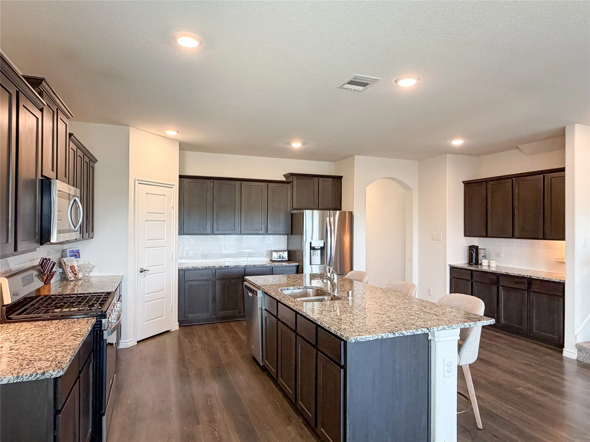 Oversized Coffee Bar and Cabinetry Makes This Kitchen Design a Favorite