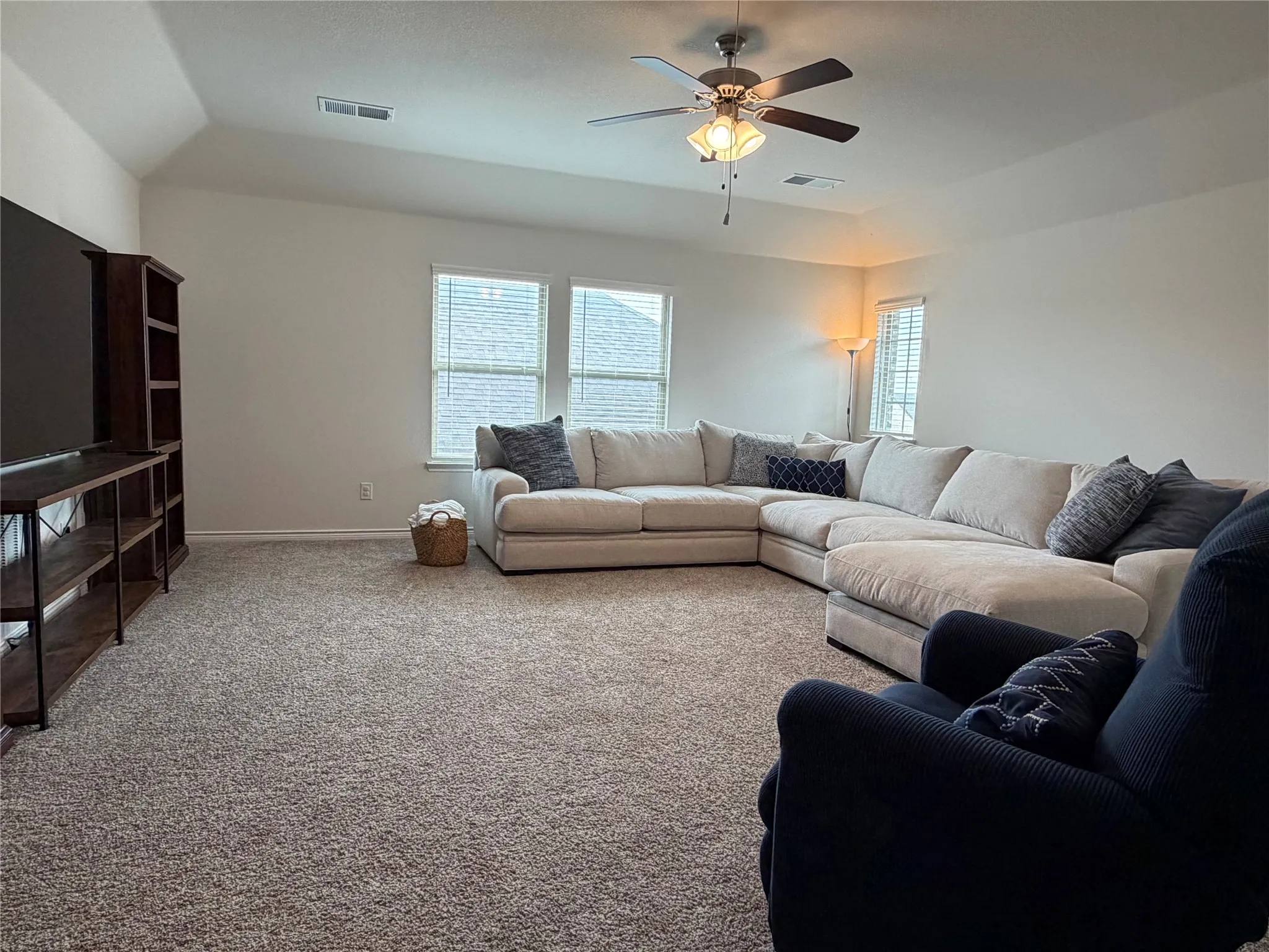 You’ll Find a Hidden Retreat Upstairs Featuring a Spacious Family Room and a Full Bath