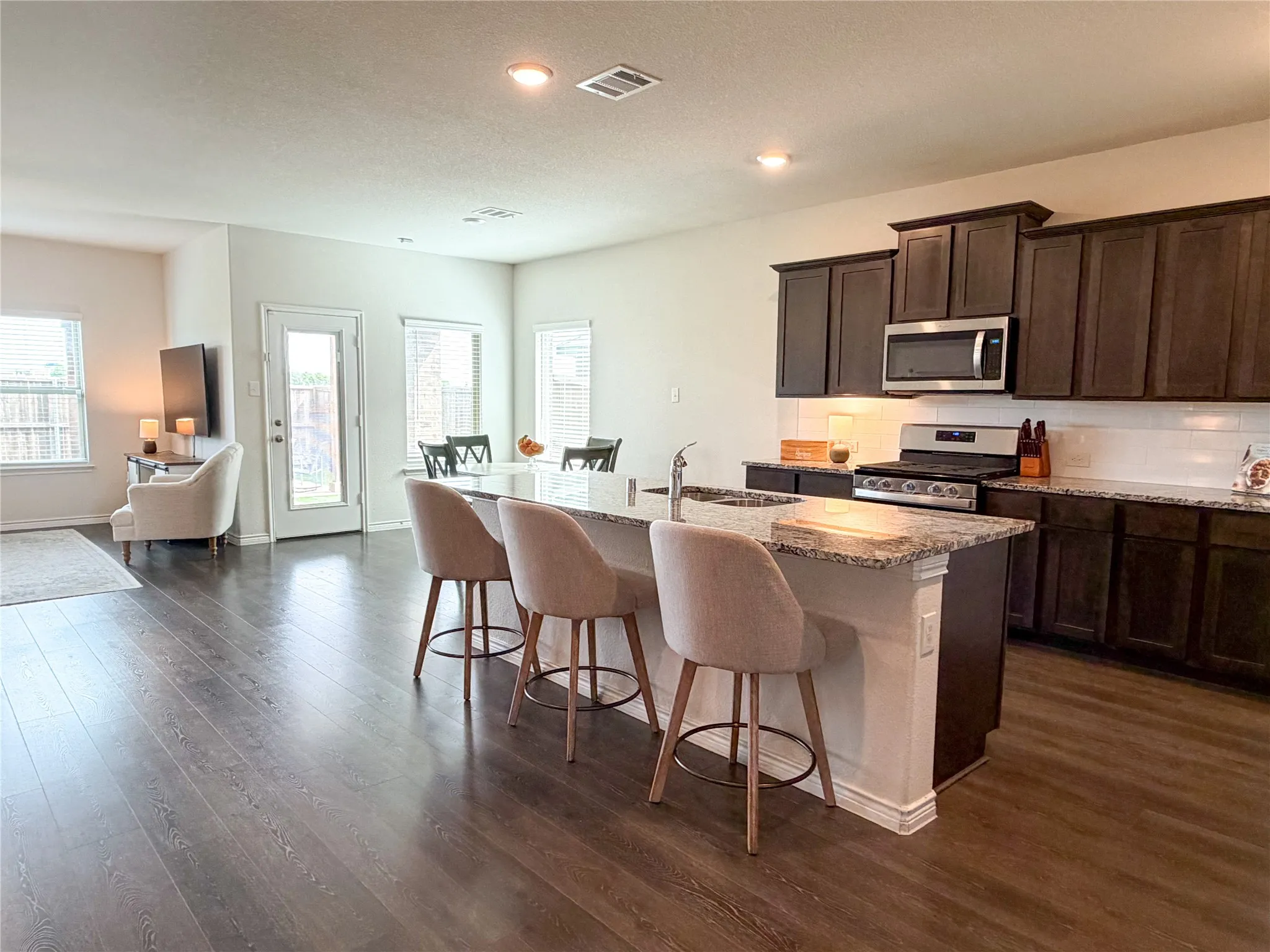 Coveted Floor Plan with Spacious Kitchen, Living and Dining