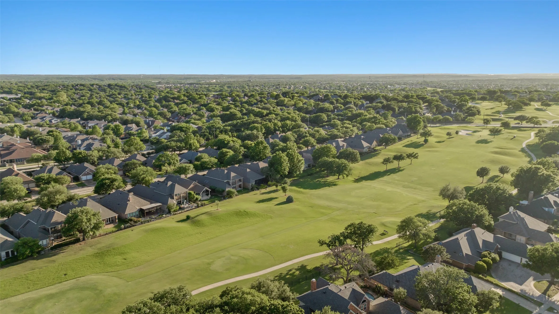 Aerial view of back of the property which is located on hole number 7 of Oakmont Country Club.