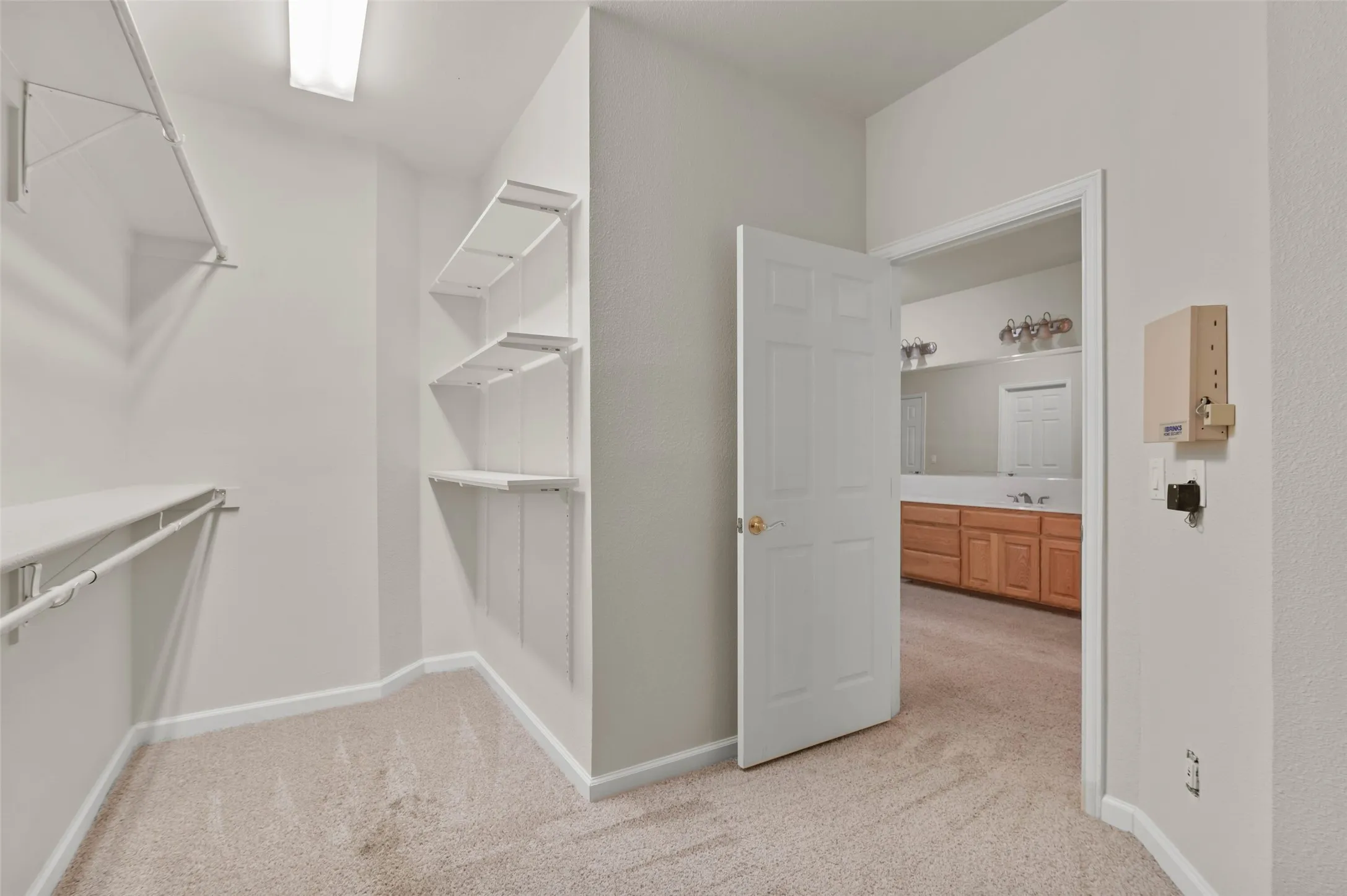 Spacious closet off the primary bathroom.