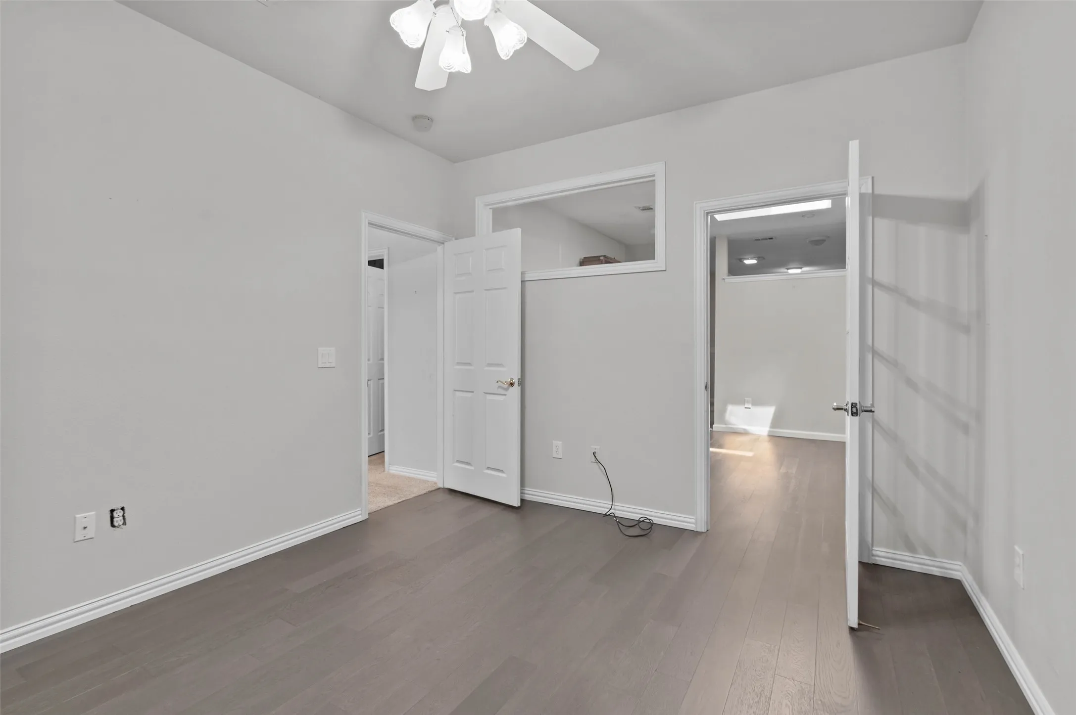 This spacious room is off the primary bathroom and could be used for many purposes.