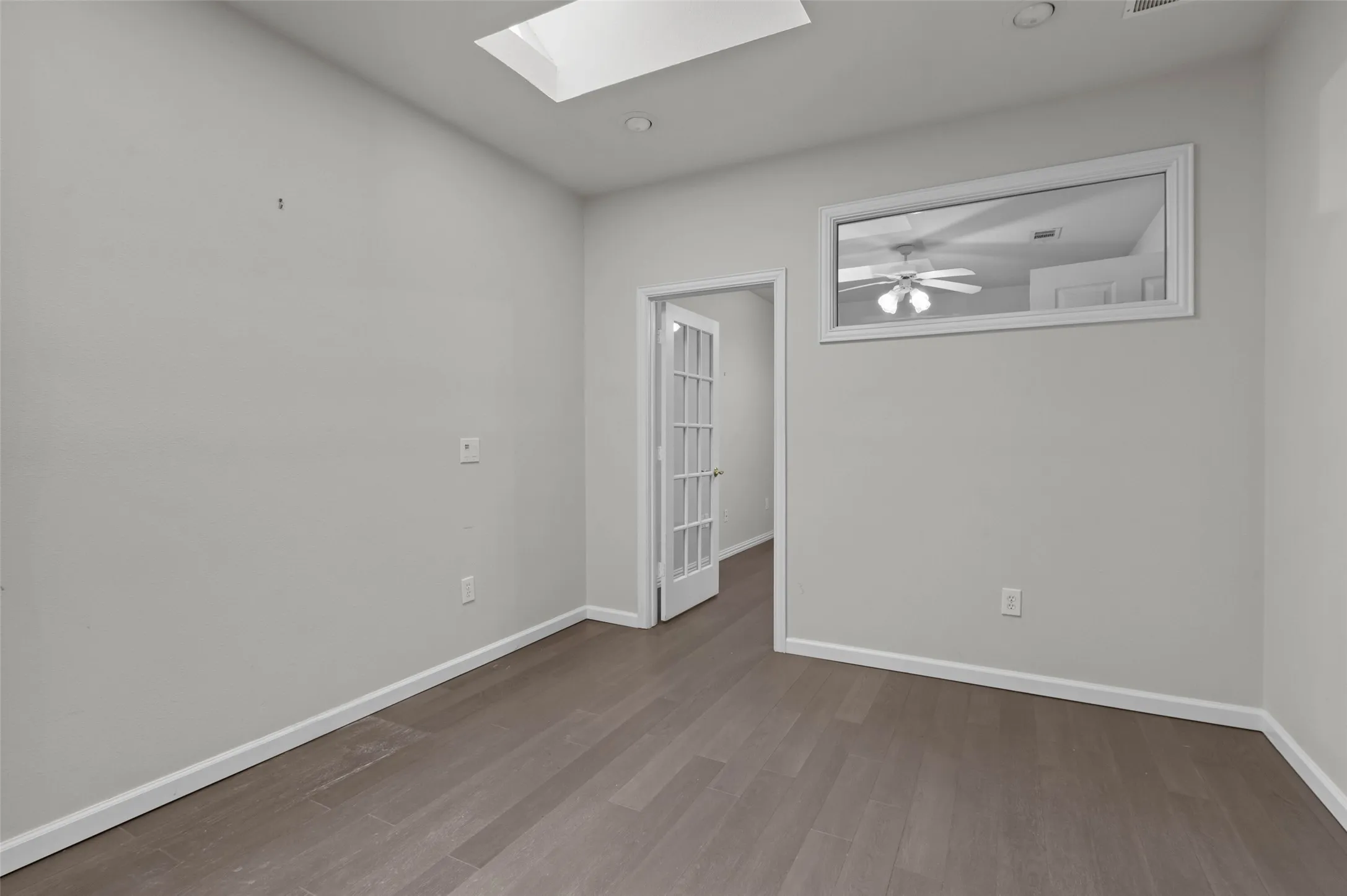 This spacious room is off the primary bathroom and could be used for many purposes.