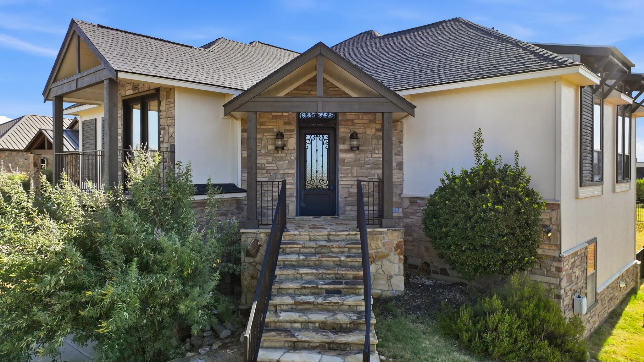 Primary open concept living area with 4 bedrooms and 2 baths at walk in level of the front door. The 5th bedroom and other ensuite bath is downstairs.