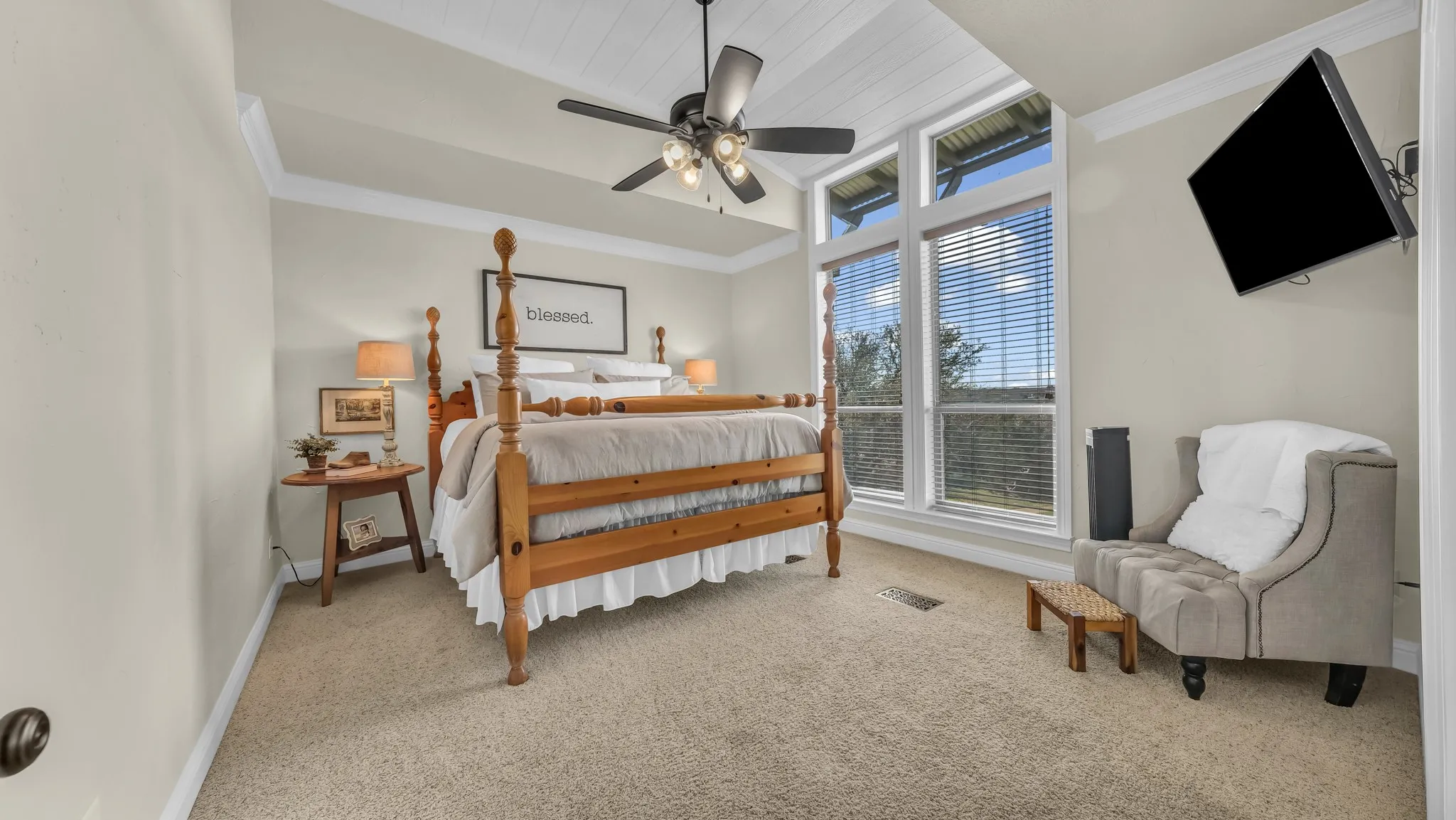 Primary bedroom is approx 11' x 15' with recessed  ceilings and large windows.