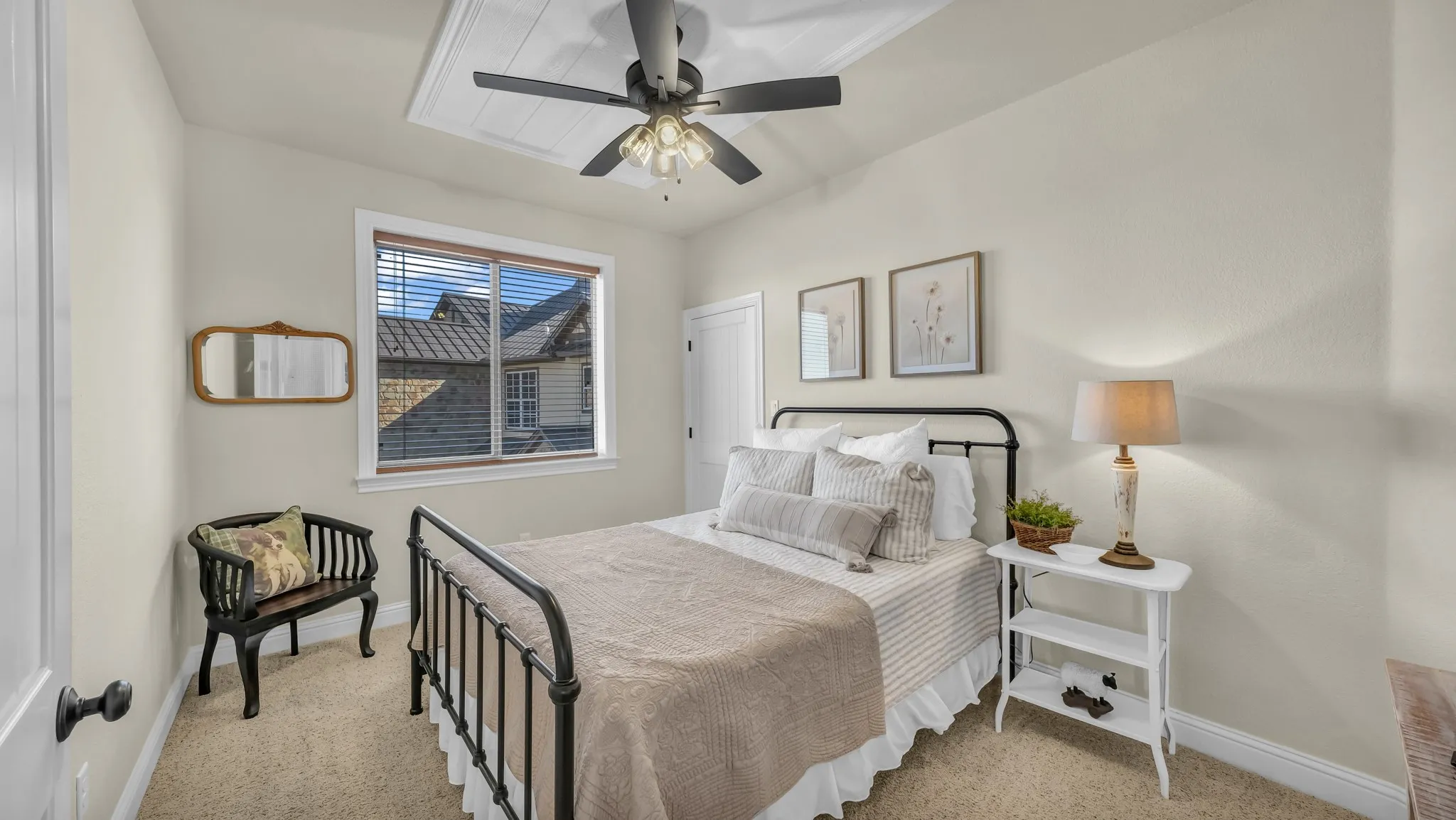 One of three bedrooms, in addition to the primary bedroom on the main floor.