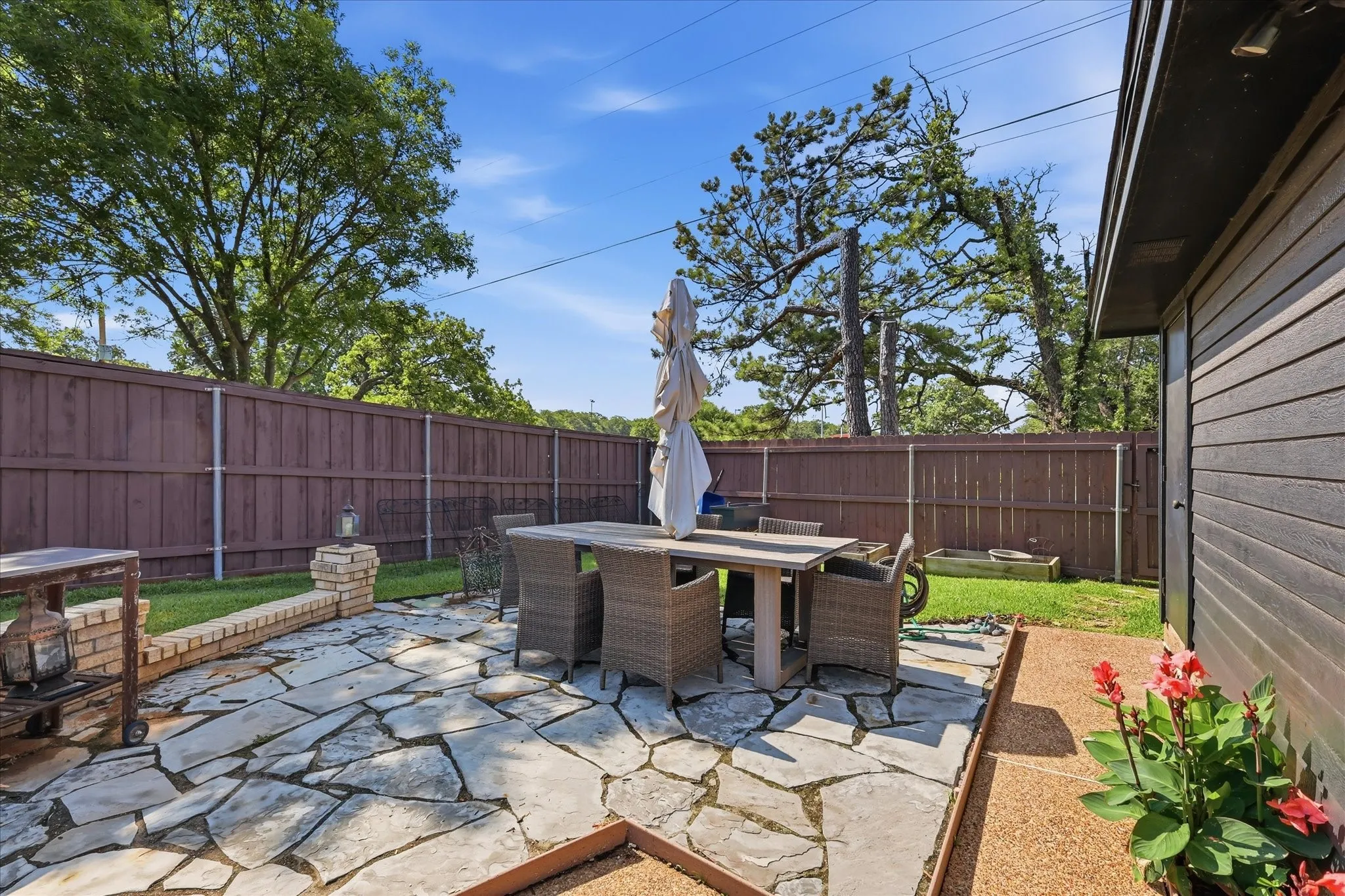 Another entertaining space in the backyard next to the pool cabana