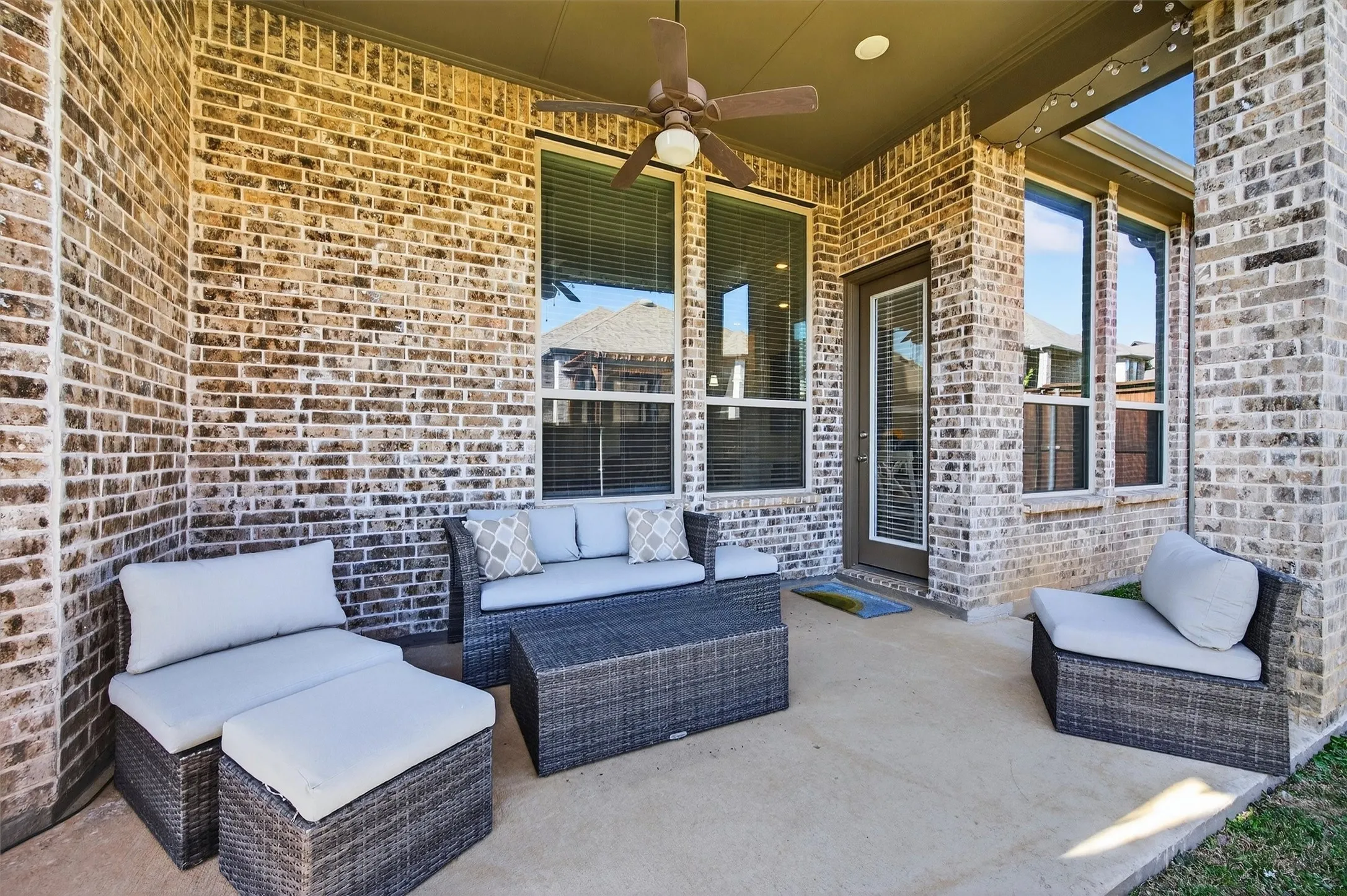 View of patio / terrace featuring a ceiling fan and outdoor lounge area