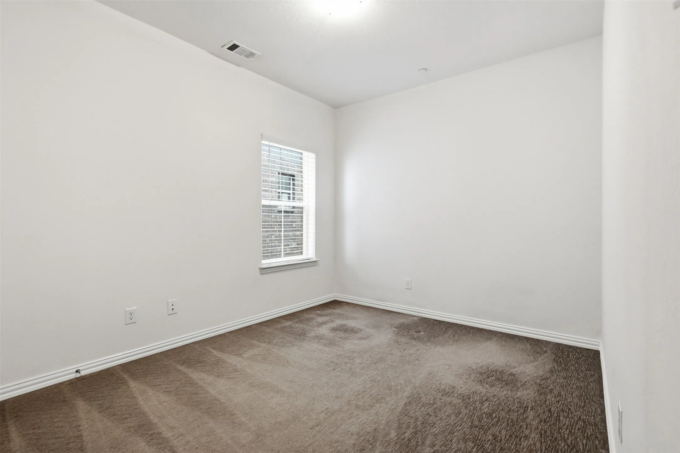 Third guest room upstairs facing the side of the property