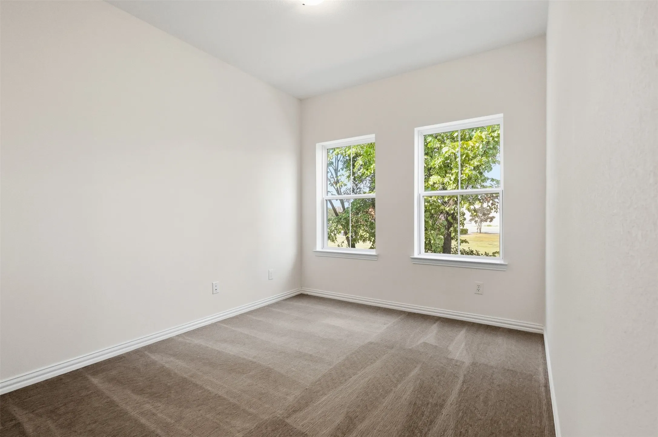 Second floor living room which can function as a play room, game room, or office