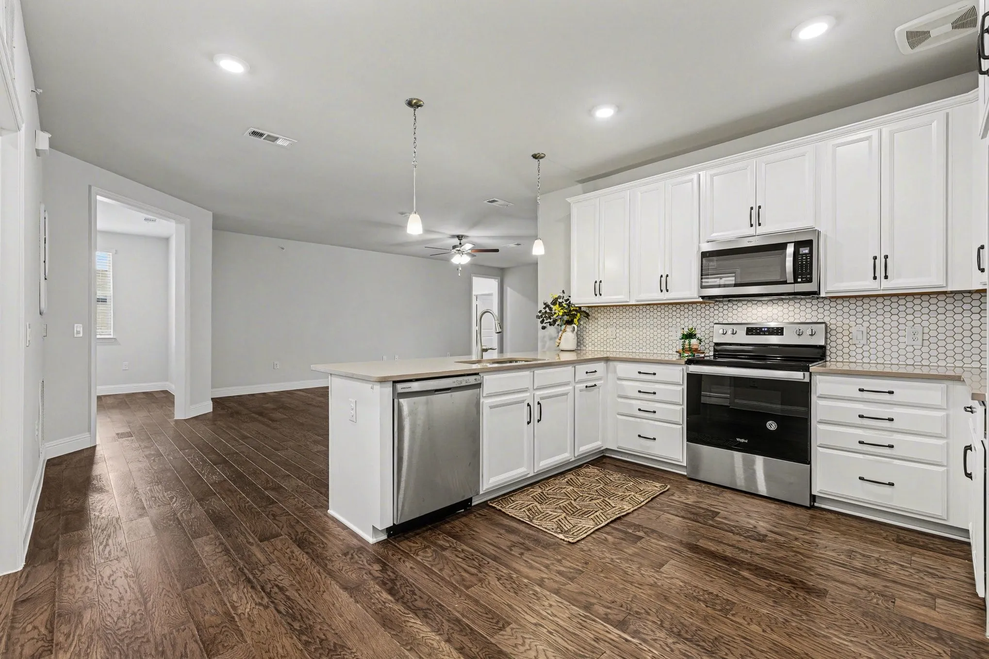 Kitchen with like-new microwave, oven and dishwasher included