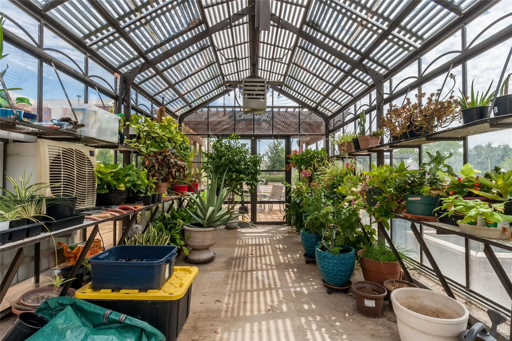 Green house with air-conditioning and automatic watering system