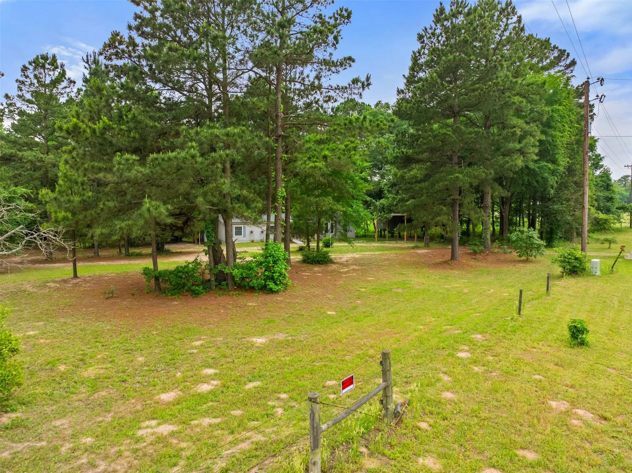 Front corner of yard next facing the property next to County Road 334