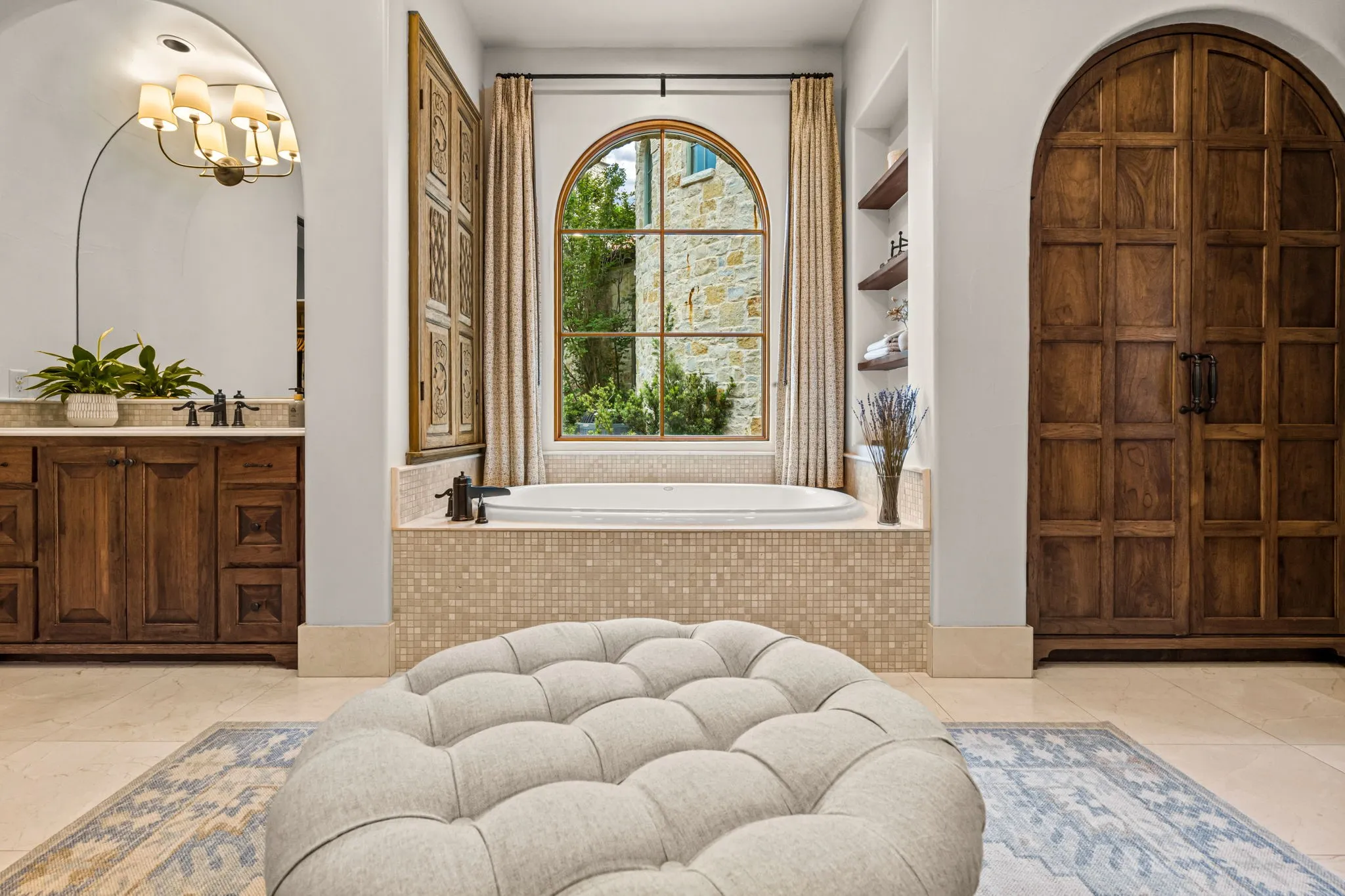 Custom made doors, marble floors and Visual Comfort lighting