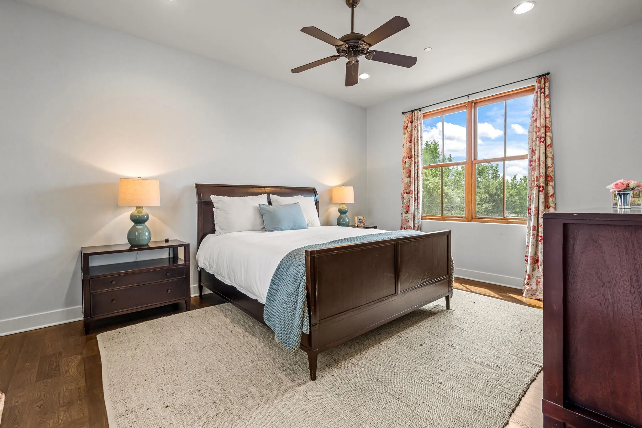 Bedroom with wood floors, ensuite bathroom