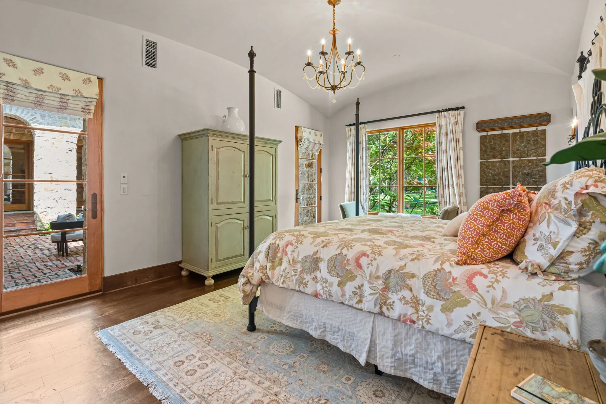 Guests will make themselves at home in this spacious guest suite with 2 doors to the front courtyard