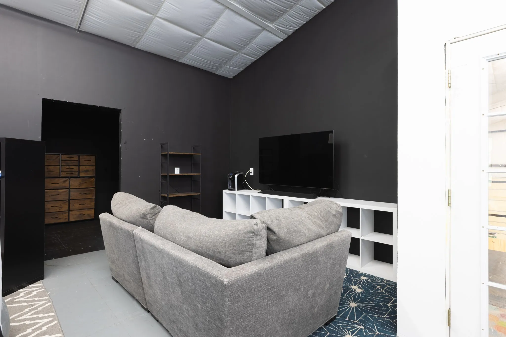 A portion of the upstairs area being used as a media room - 2500 sq ft.  Could easily be converted to separate areas by adding walls and-or partitions.