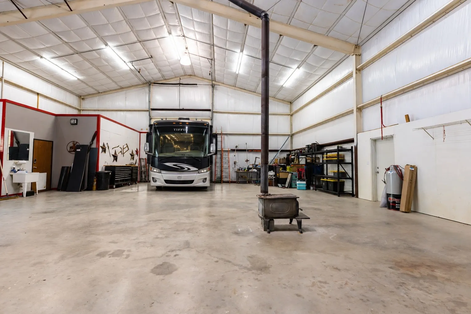 Virtually Staged 2500 Sq Ft Workshop with RV Added.