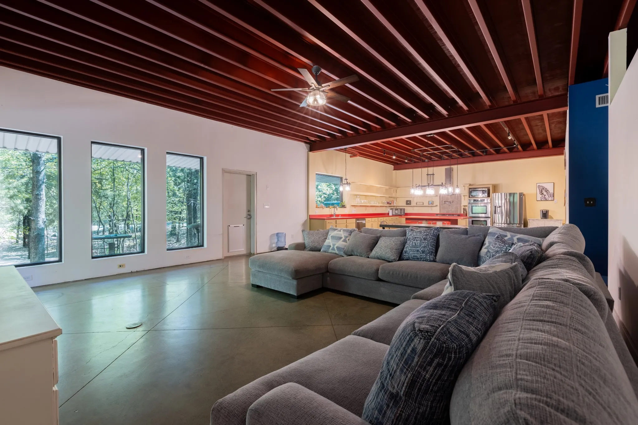 Open floorplan...huge living area with large windows and an abundance of natural light.